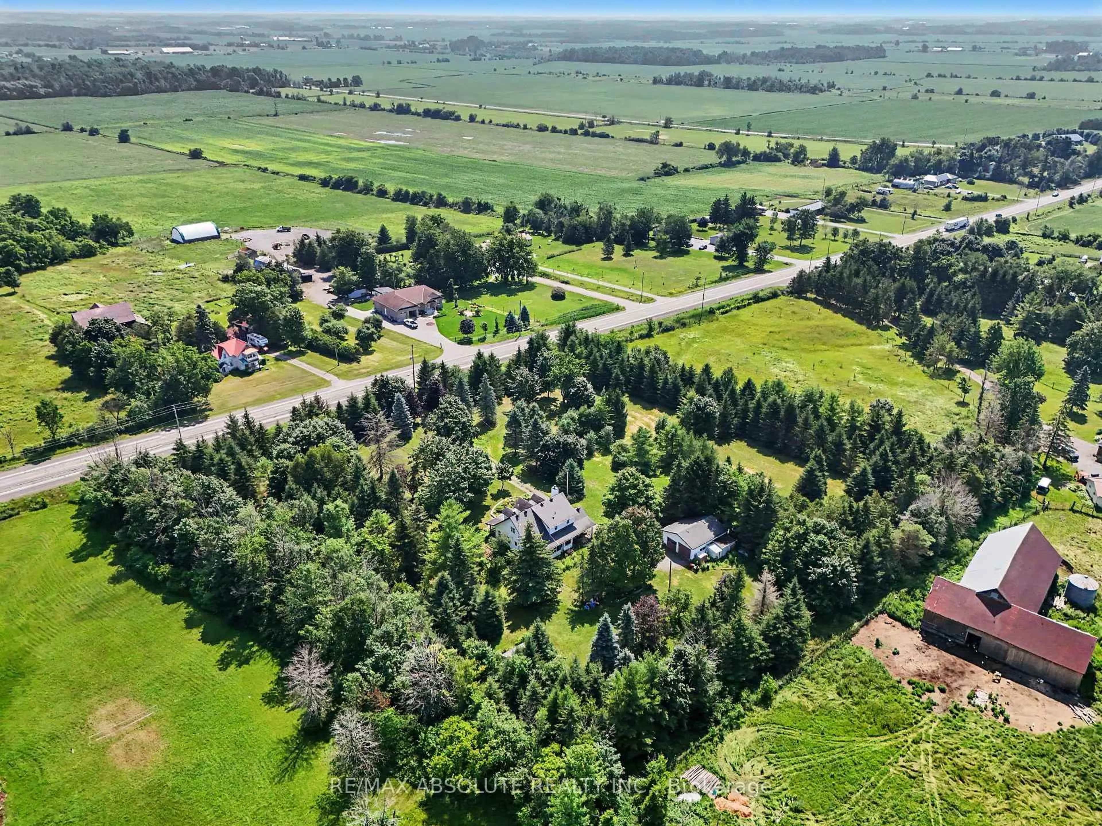 A pic from outside/outdoor area/front of a property/back of a property/a pic from drone, unknown for 8306 Bank St, Metcalfe Ontario K0A 2P0