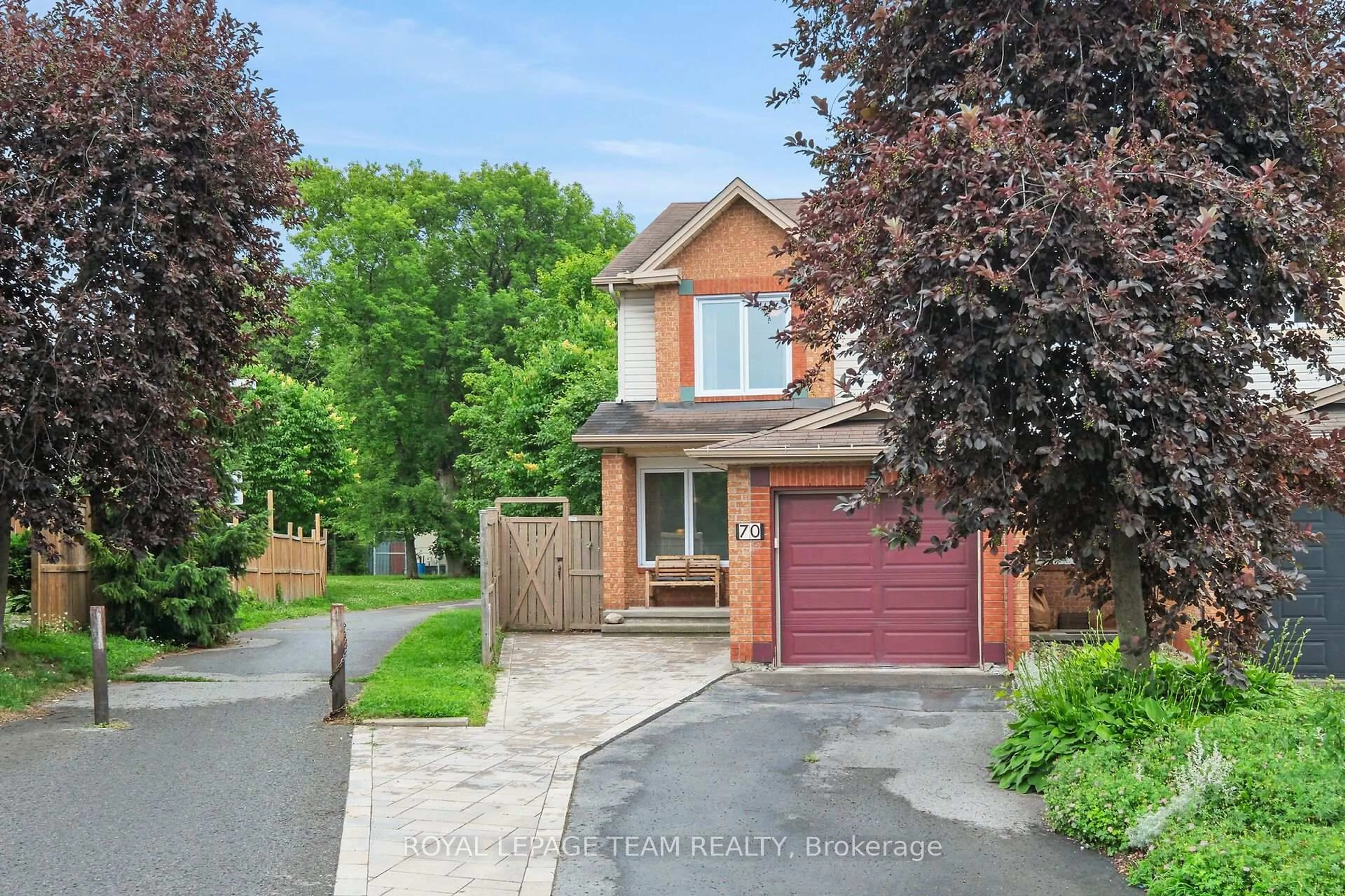 Home with brick exterior material, street for 70 College Circ, Ottawa Ontario K1K 4R8