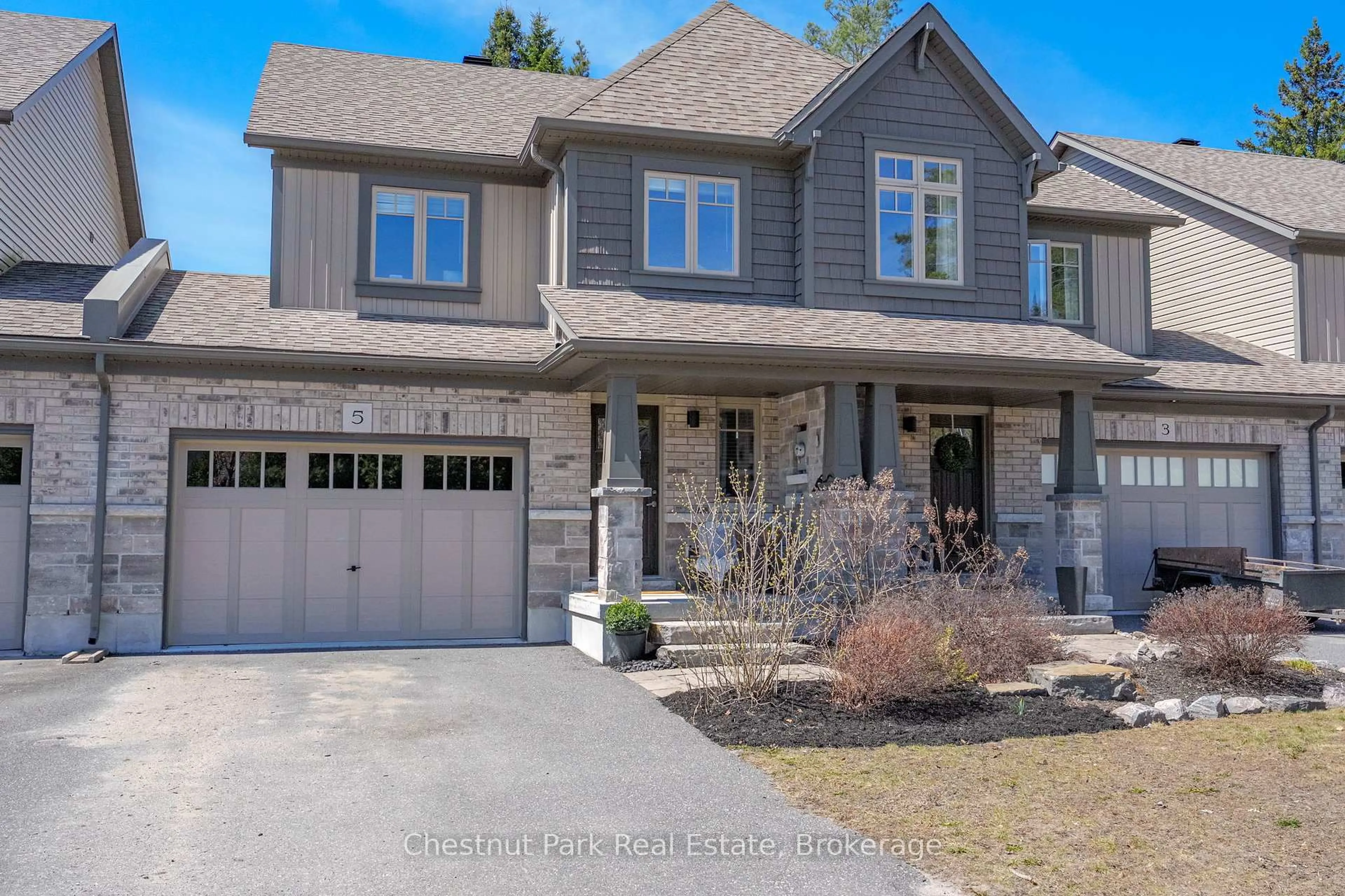 Home with brick exterior material, street for 5 Brookside Crossing, Huntsville Ontario P1H 1C9