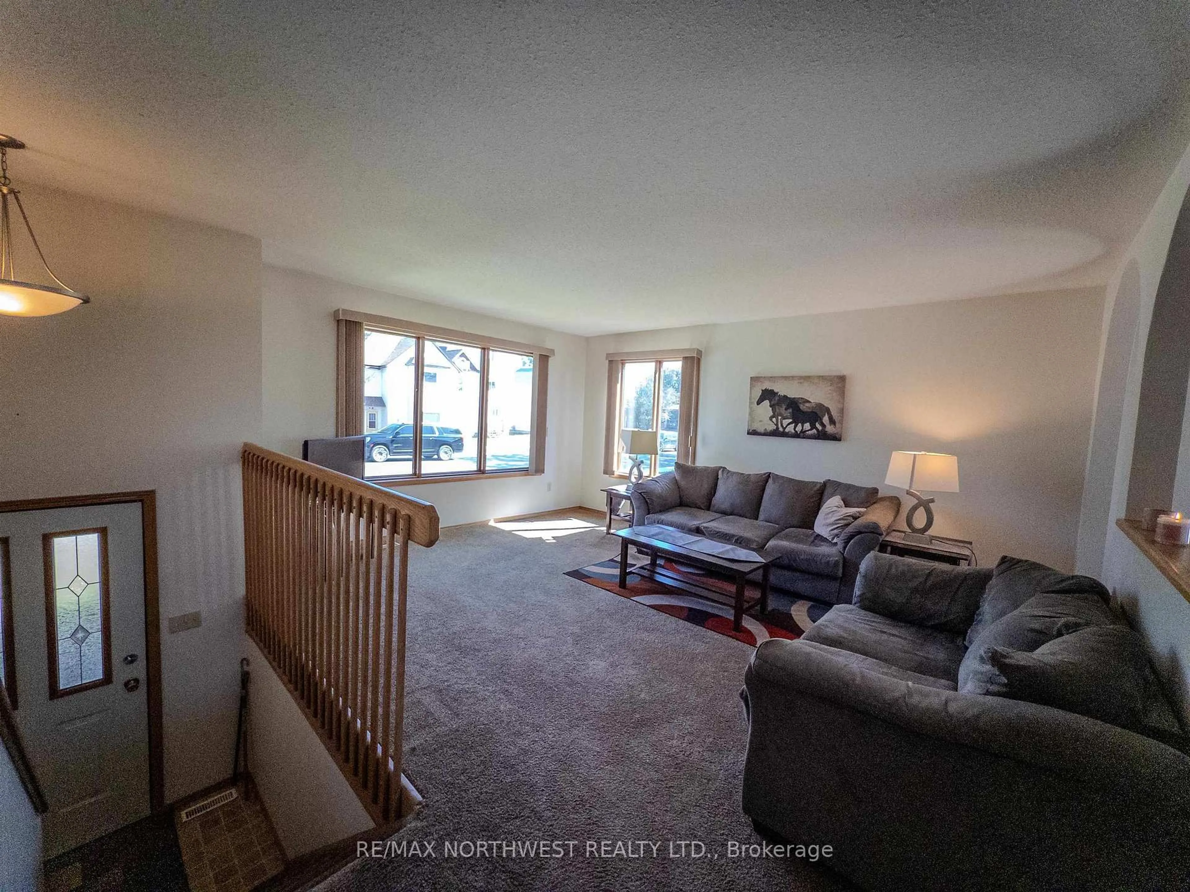 Living room with furniture, unknown for 527 Second Street South, Kenora Ontario P9N 1G5