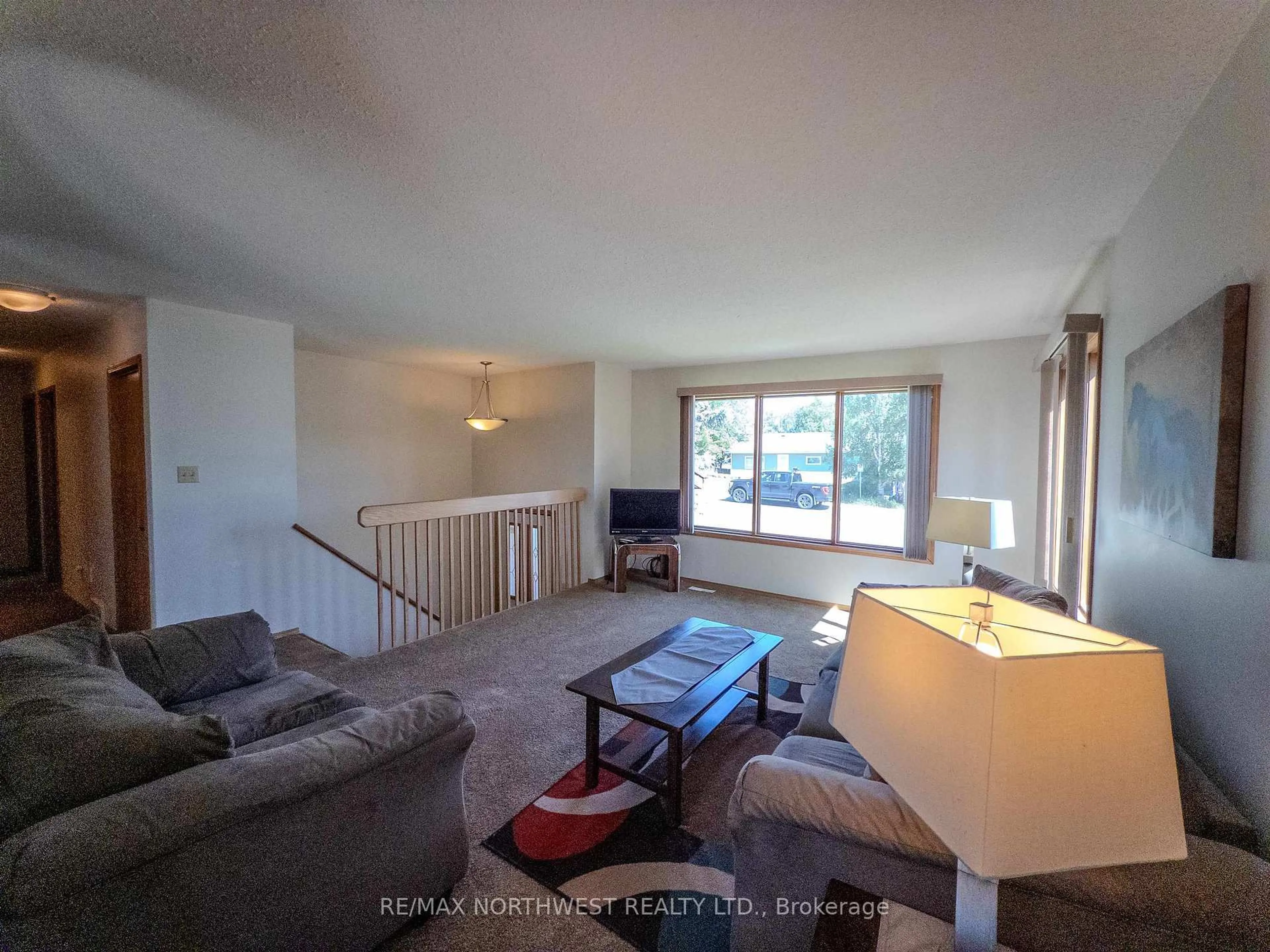 Living room with furniture, unknown for 527 Second Street South, Kenora Ontario P9N 1G5