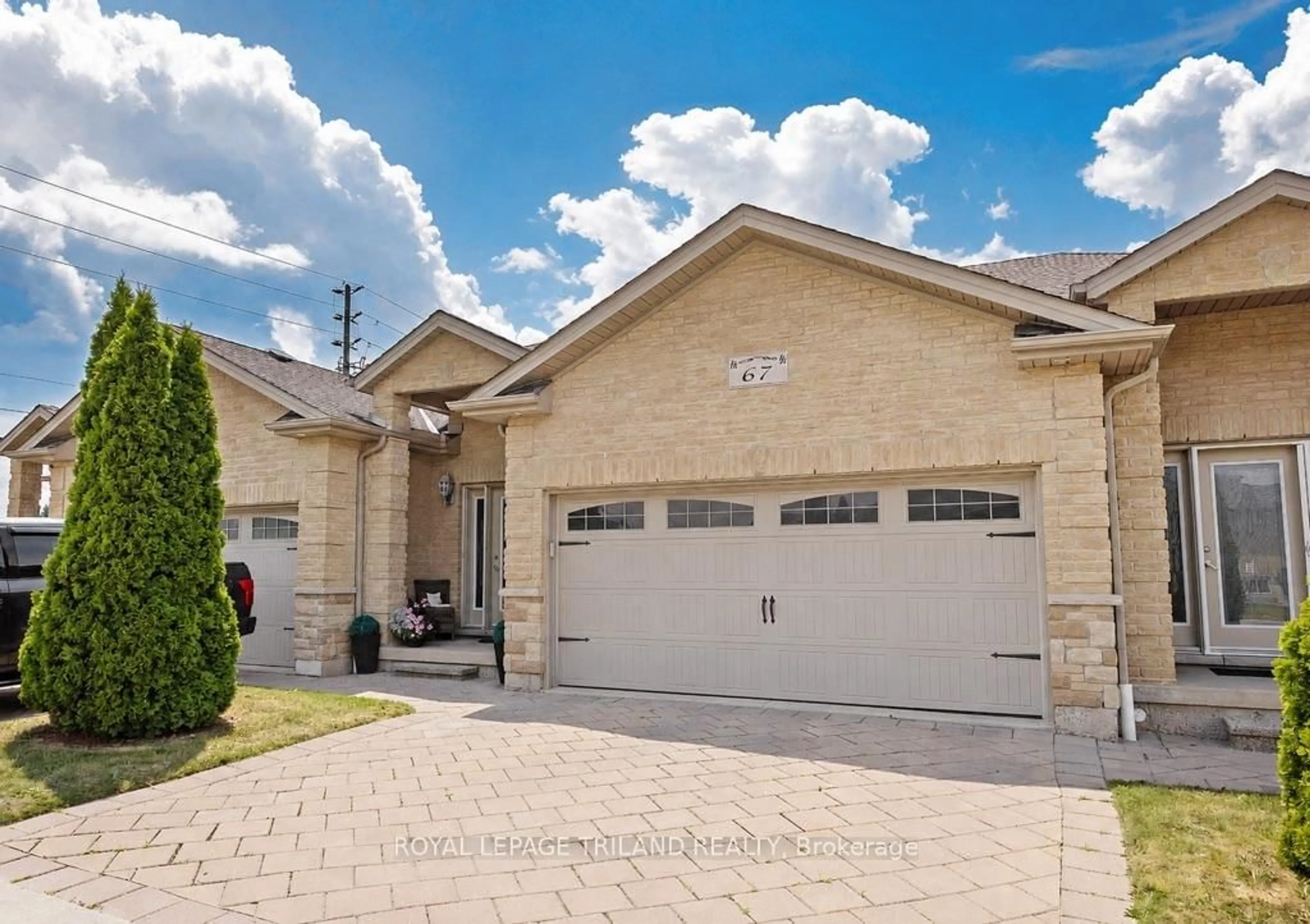 Home with brick exterior material, street for 70 Tanoak Dr #67, London North Ontario N6G 5R3