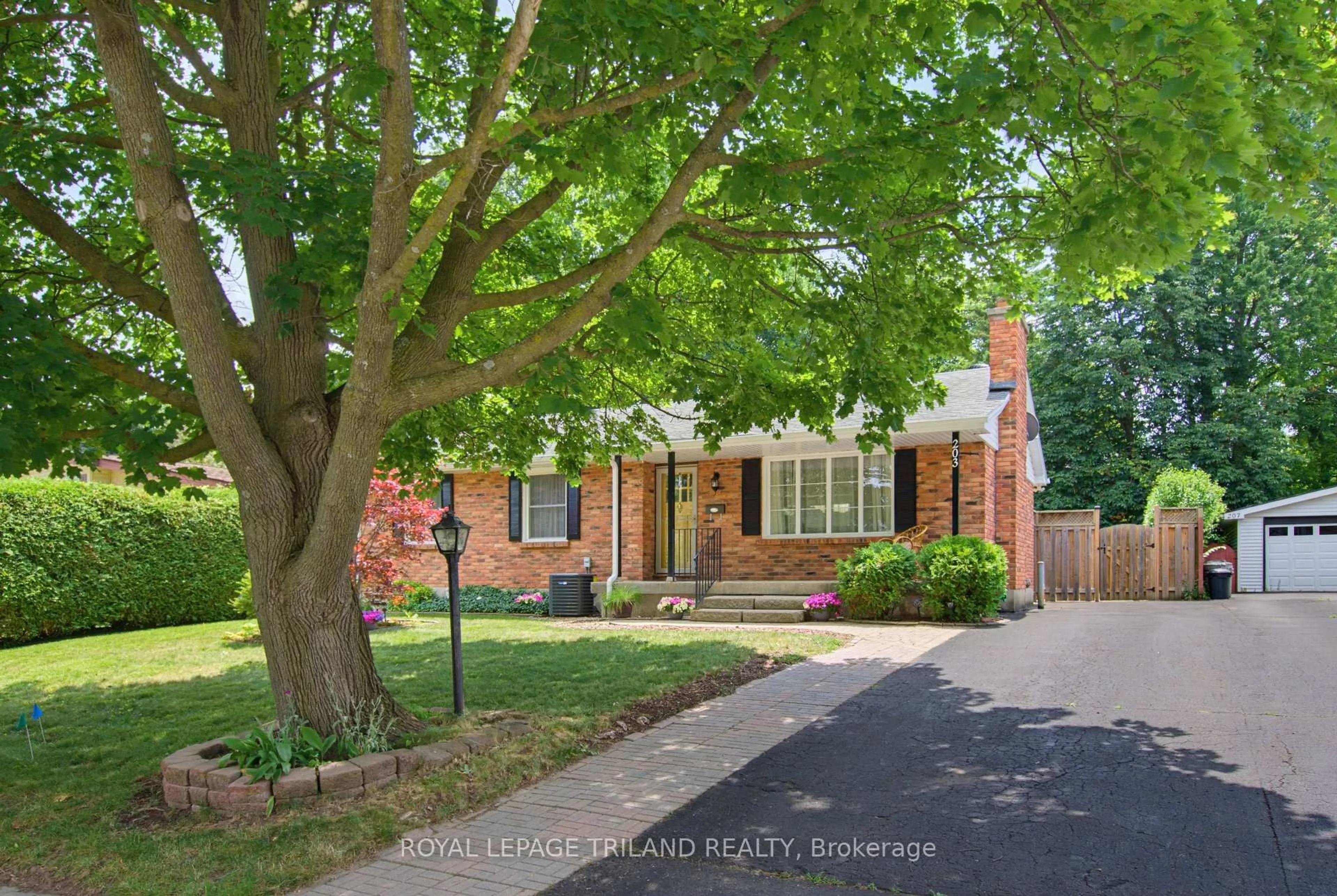 Home with brick exterior material, street for 203 Tavistock Rd, London South Ontario N6J 1Z7