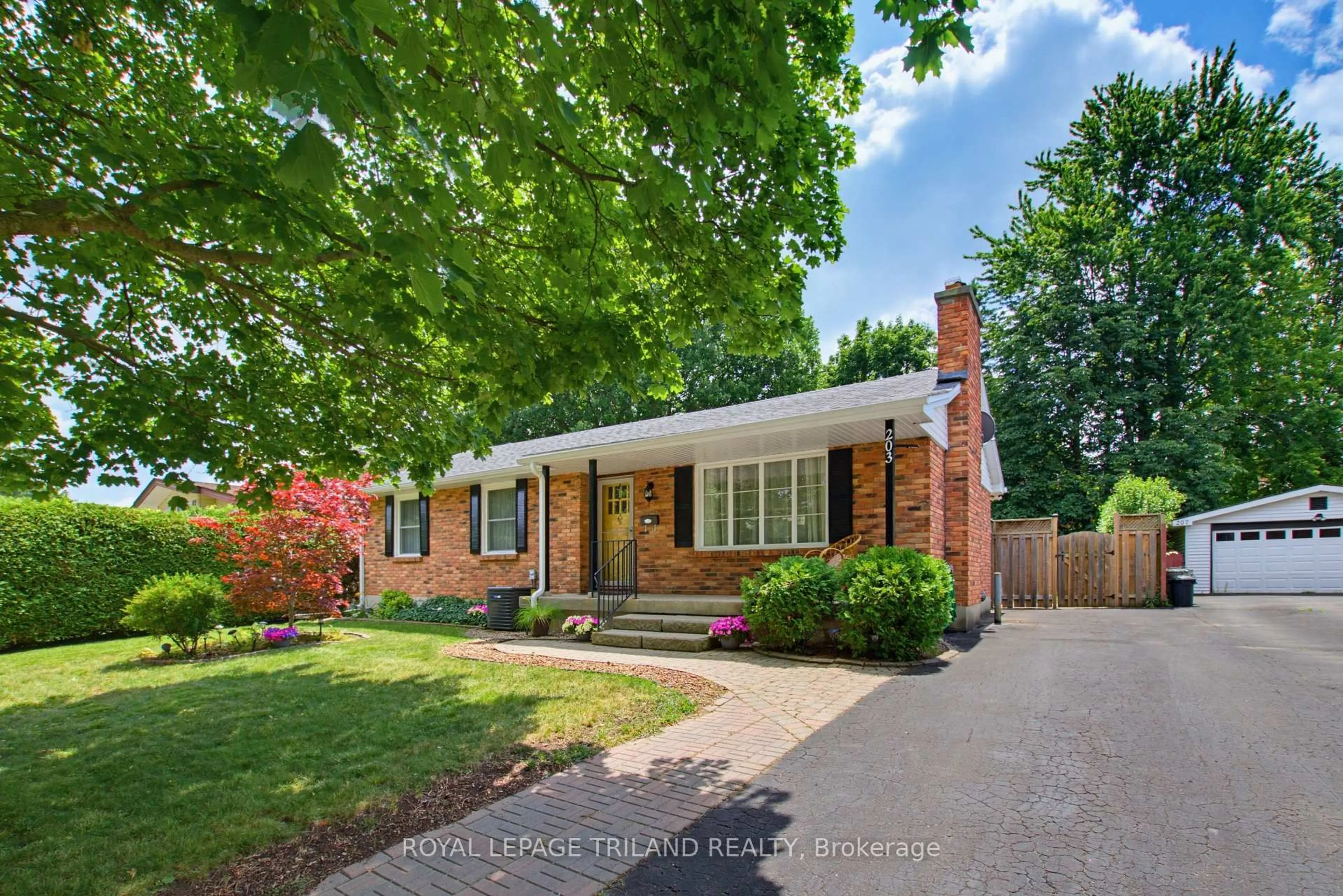Home with brick exterior material, street for 203 Tavistock Rd, London South Ontario N6J 1Z7
