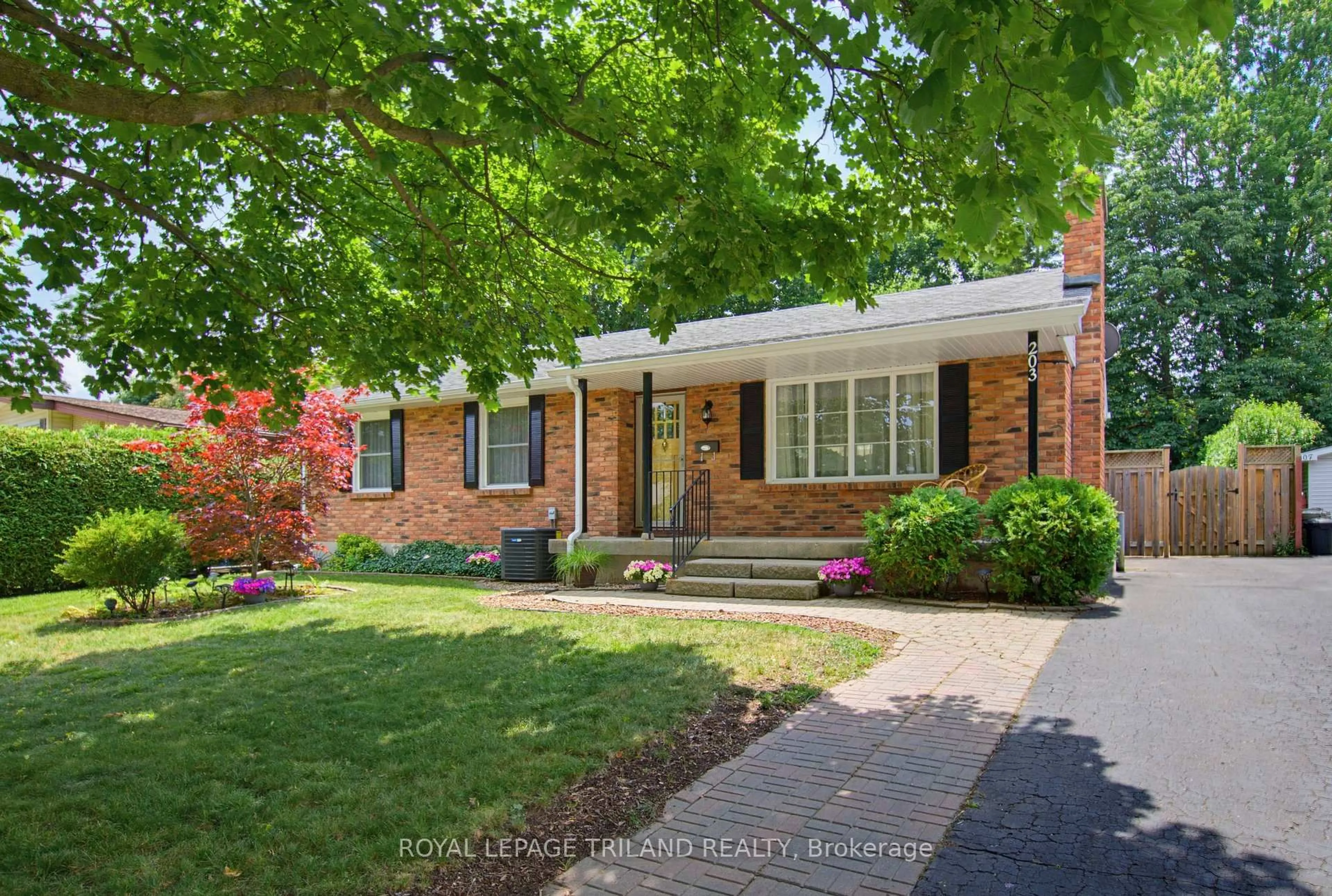 Home with brick exterior material, street for 203 Tavistock Rd, London South Ontario N6J 1Z7