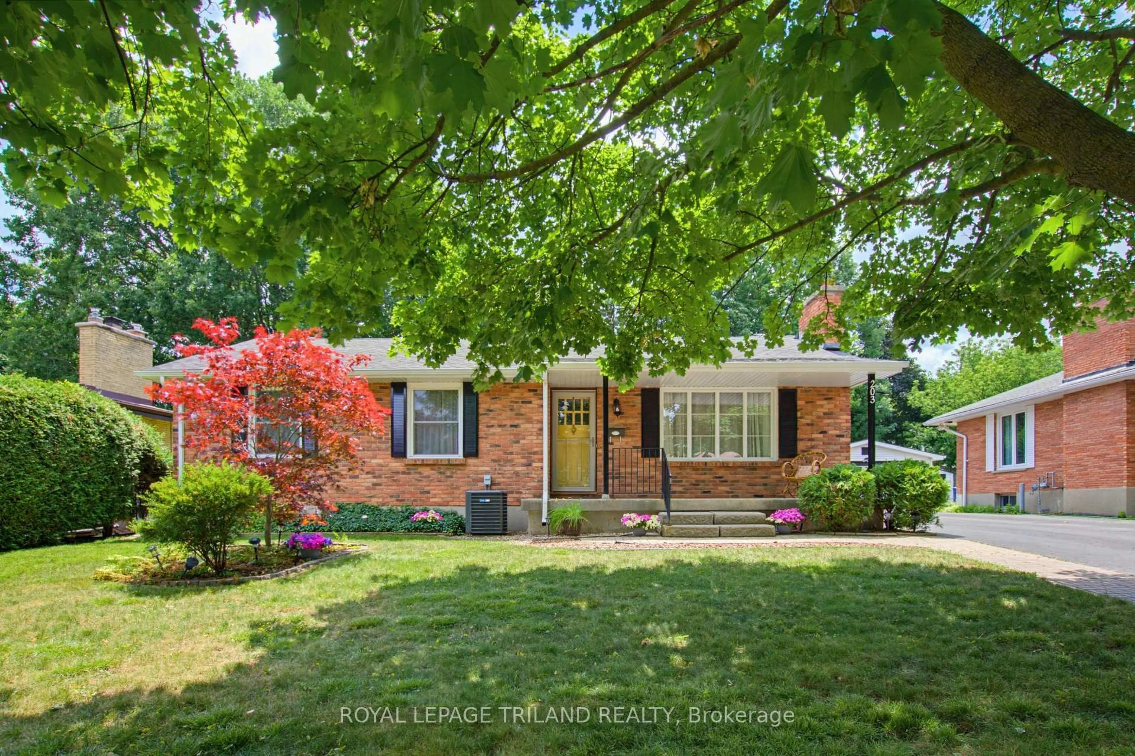 Home with brick exterior material, street for 203 Tavistock Rd, London South Ontario N6J 1Z7