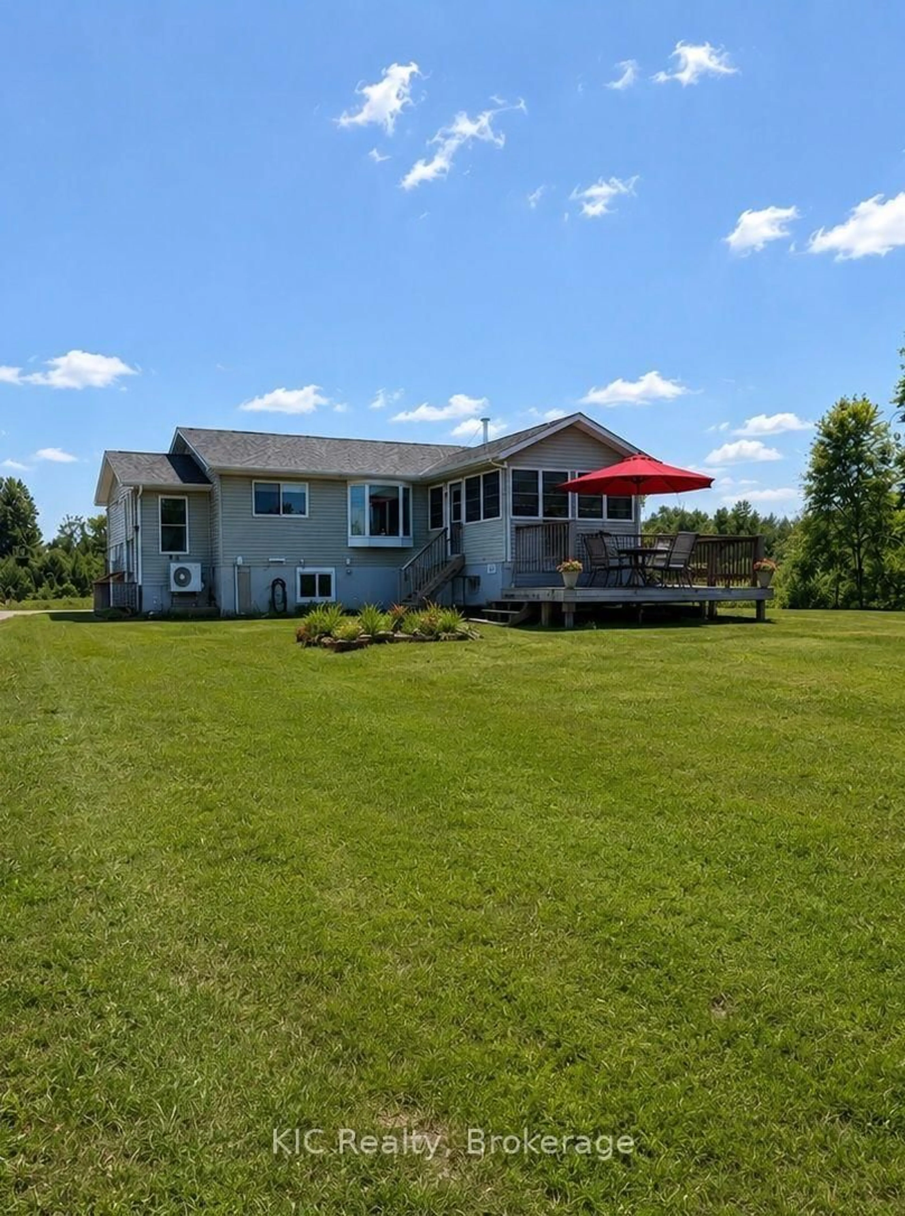 A pic from outside/outdoor area/front of a property/back of a property/a pic from drone, water/lake/river/ocean view for 221 Jones Rd, Madoc Ontario K0K 2K0