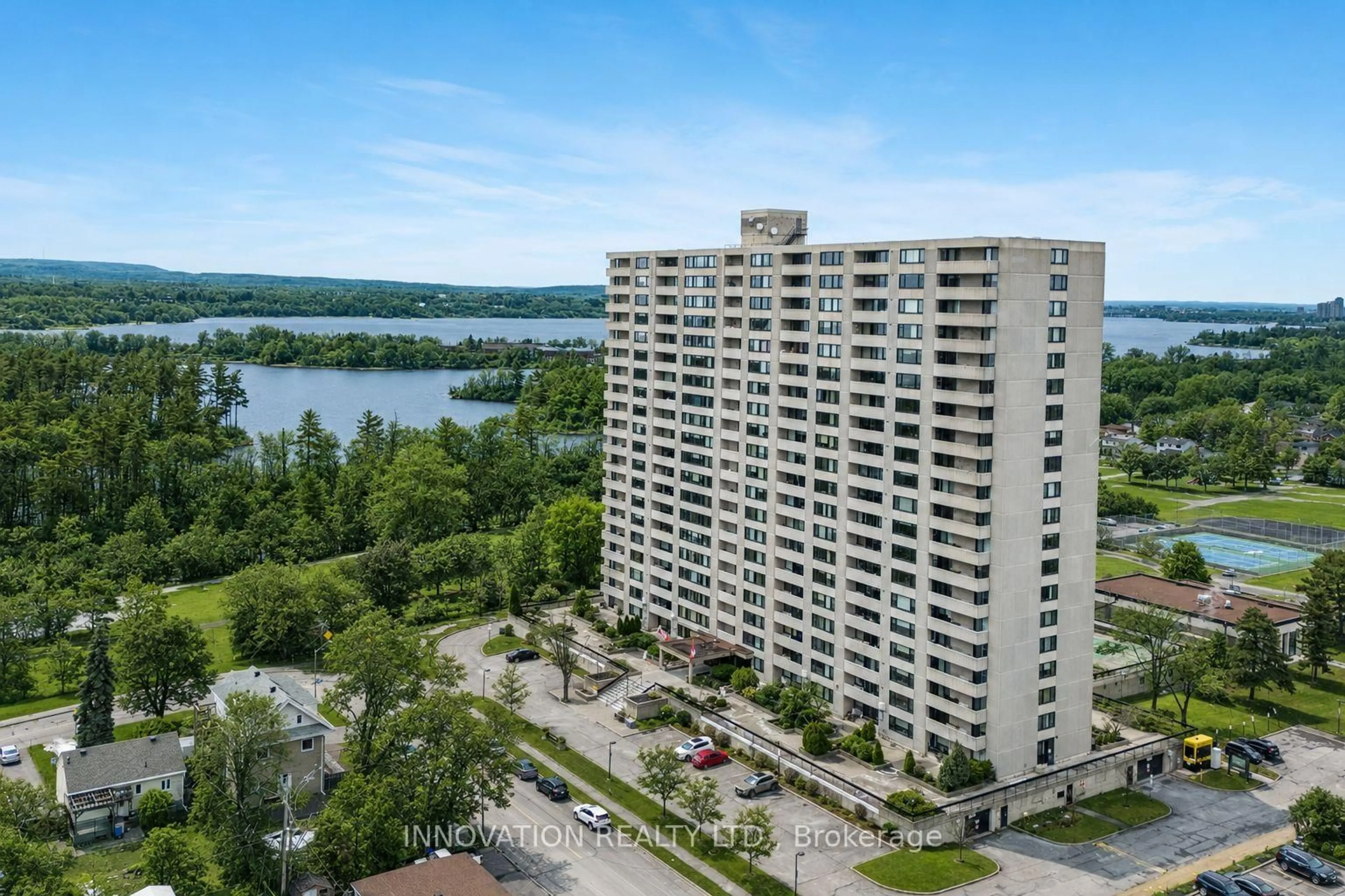 A pic from outside/outdoor area/front of a property/back of a property/a pic from drone, water/lake/river/ocean view for 265 Poulin Ave #807, Ottawa Ontario K2B 7Y8