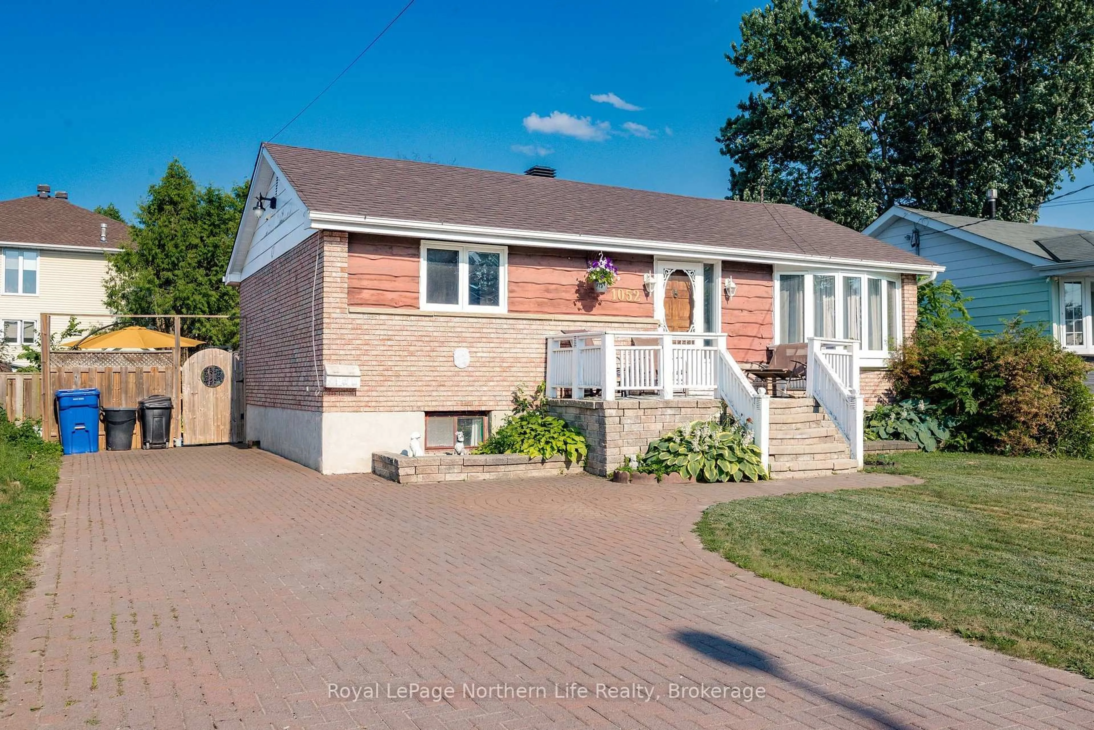 Home with brick exterior material, street for 1052 Frost St, North Bay Ontario P1B 6C9
