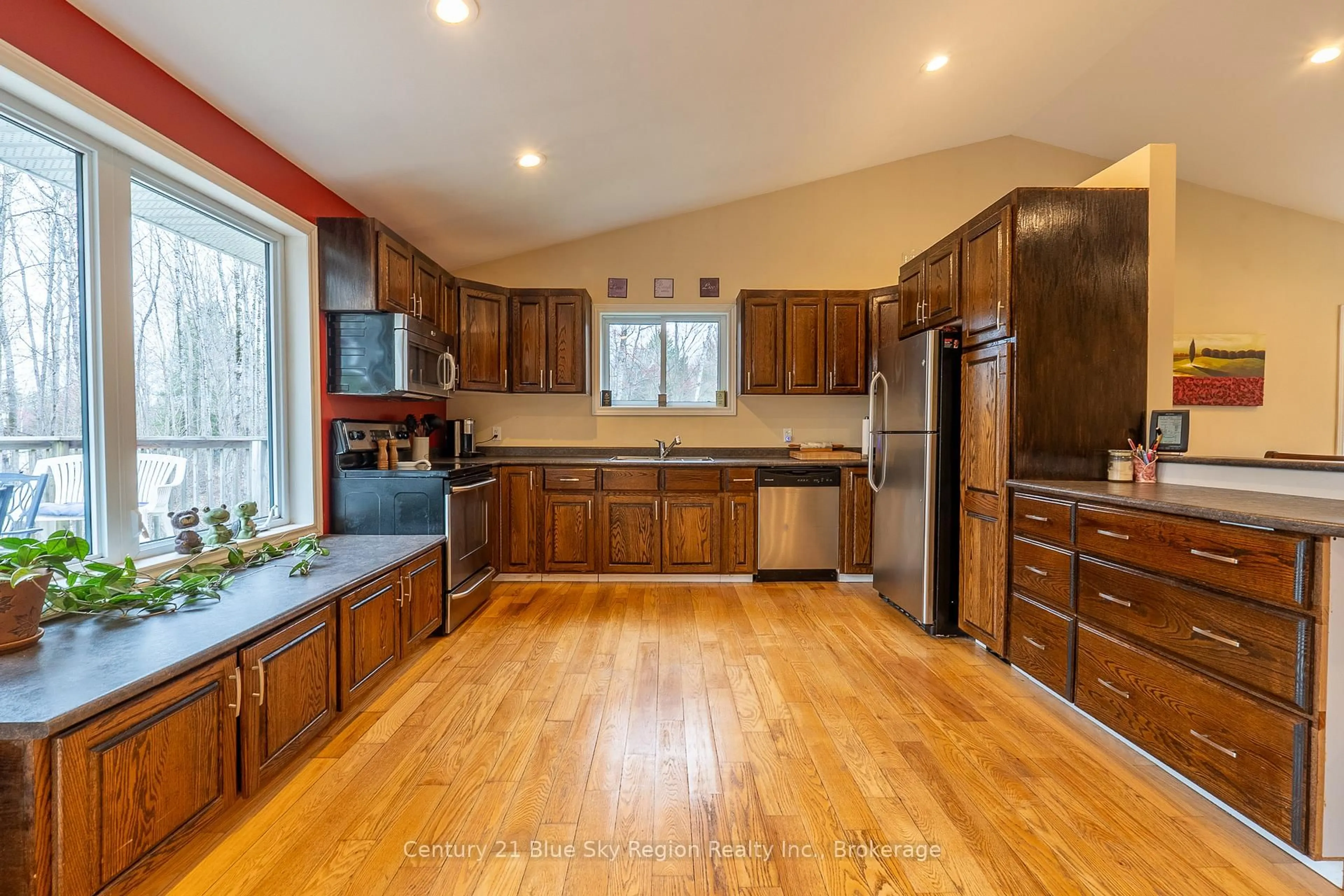 Open concept kitchen, wood/laminate floor for 1518 PINECREEK Rd, Callander Ontario P0H 1H0