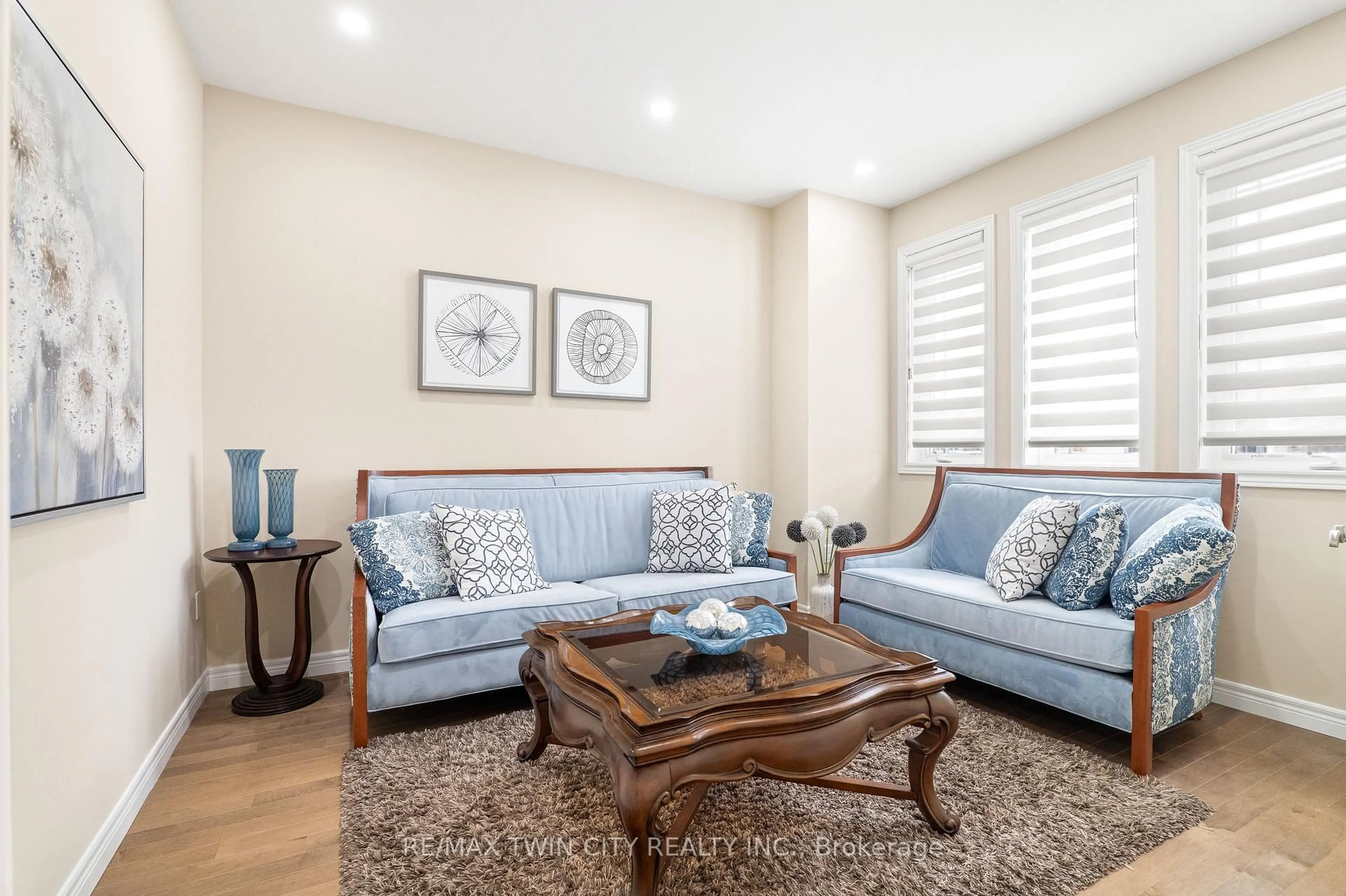 Living room with furniture, wood/laminate floor for 369 Rivertrail Ave, Kitchener Ontario N2A 0K4