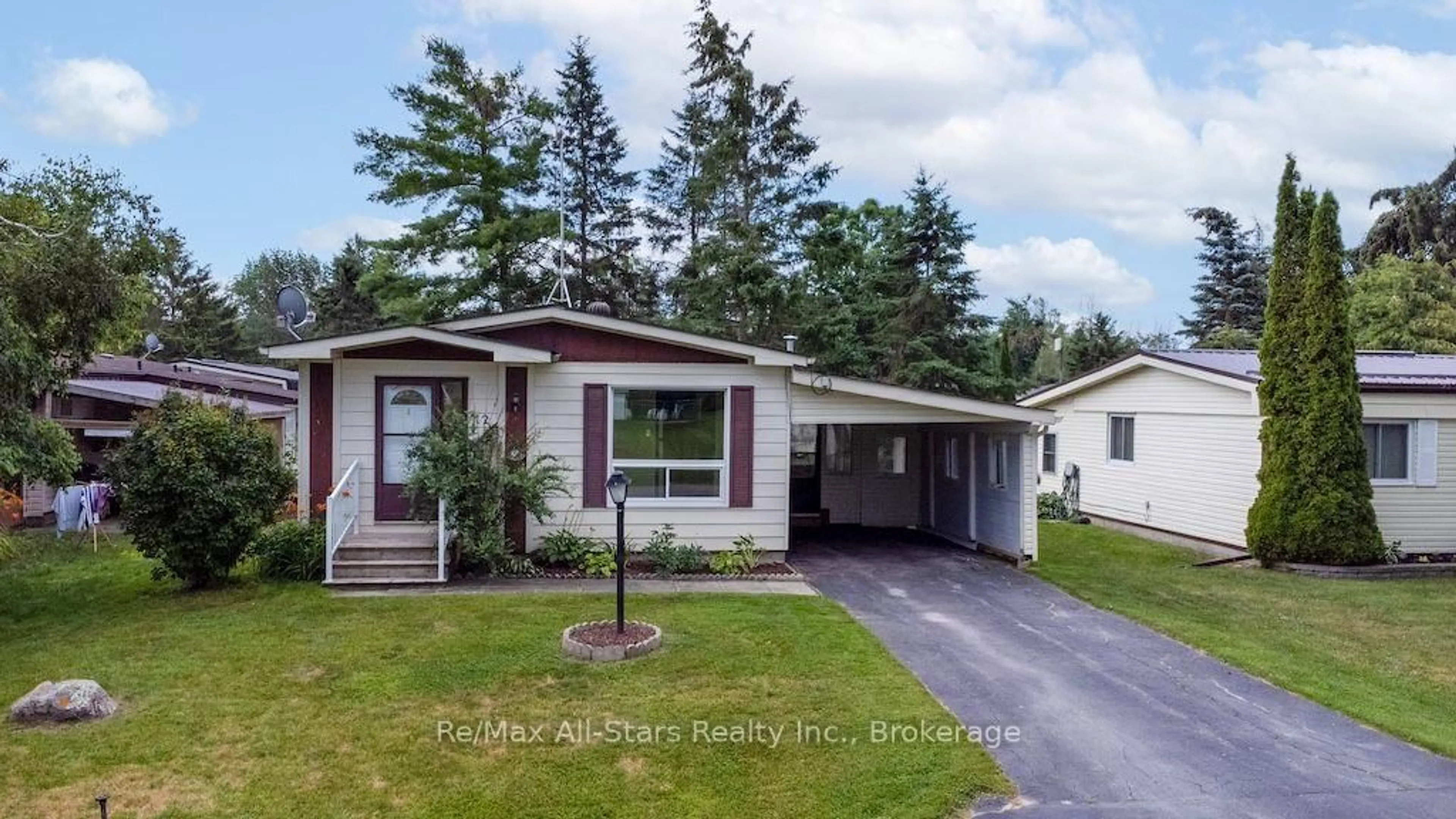 Home with vinyl exterior material, street for 12 Park St, Kawartha Lakes Ontario K9V 0H7
