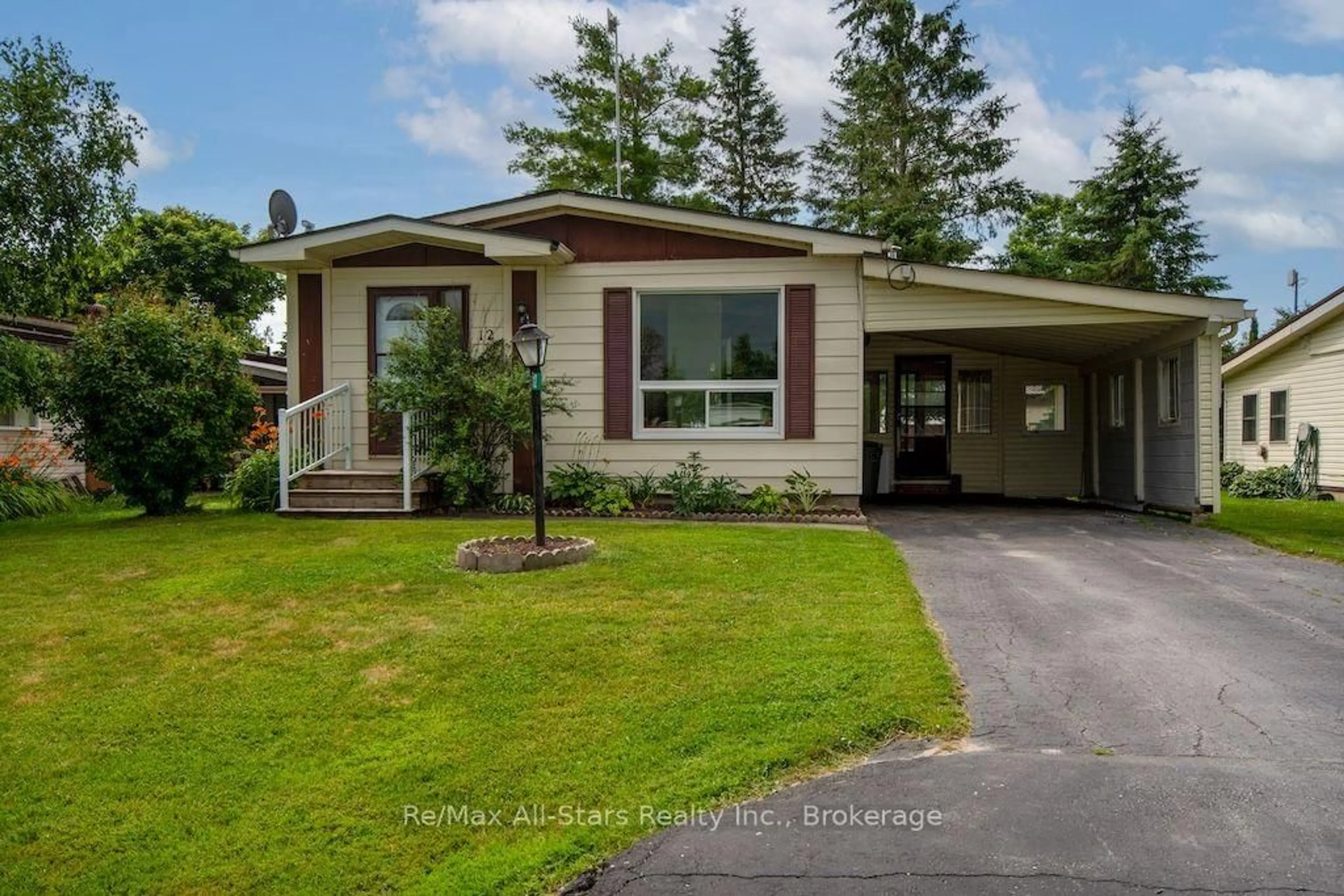 Home with vinyl exterior material, street for 12 Park St, Kawartha Lakes Ontario K9V 0H7