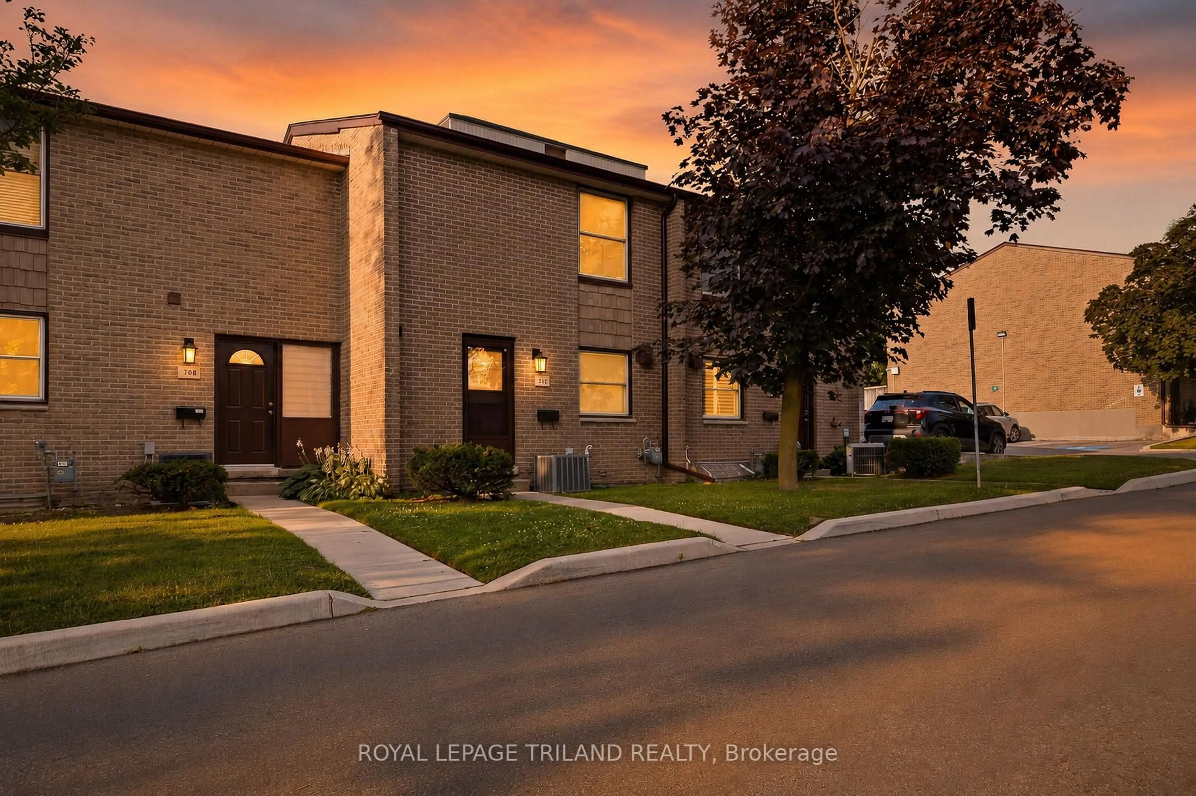 A pic from outside/outdoor area/front of a property/back of a property/a pic from drone, street for 710 Wonderland Rd #8, London South Ontario N6K 1L8
