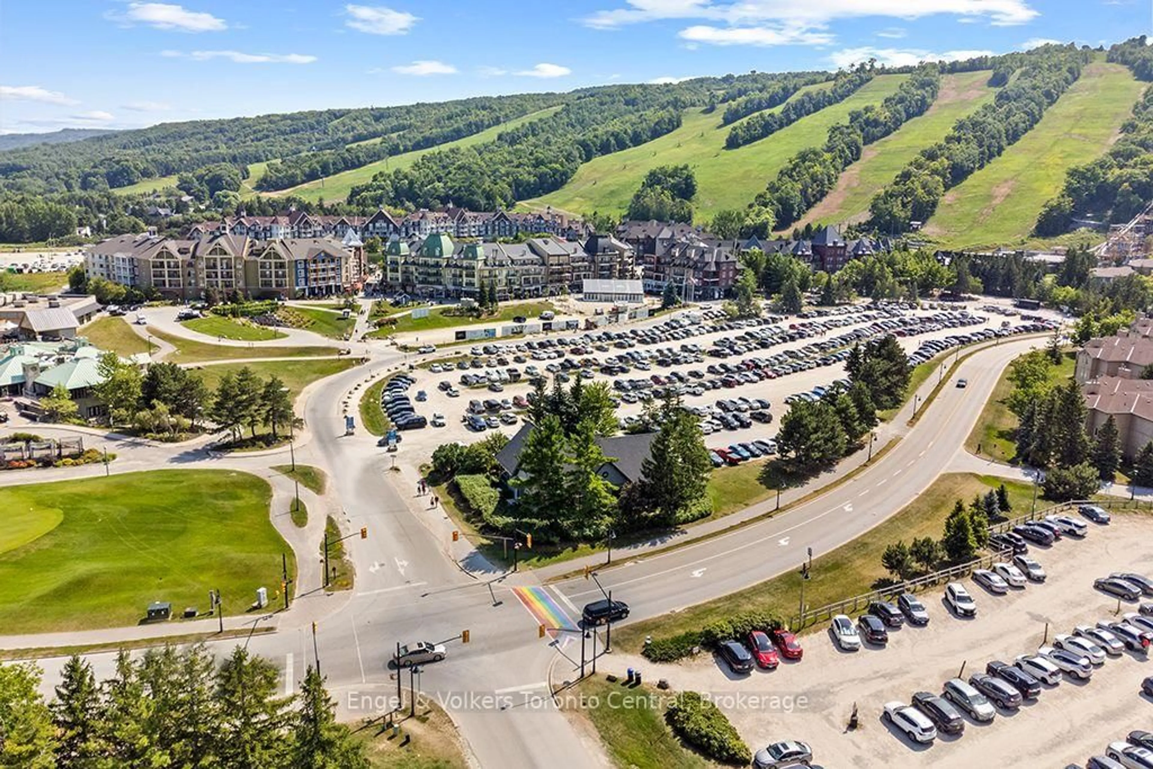 A pic from outside/outdoor area/front of a property/back of a property/a pic from drone, mountain view for 156 Jozo Weider Blvd #139, Blue Mountains Ontario L9Y 0V2