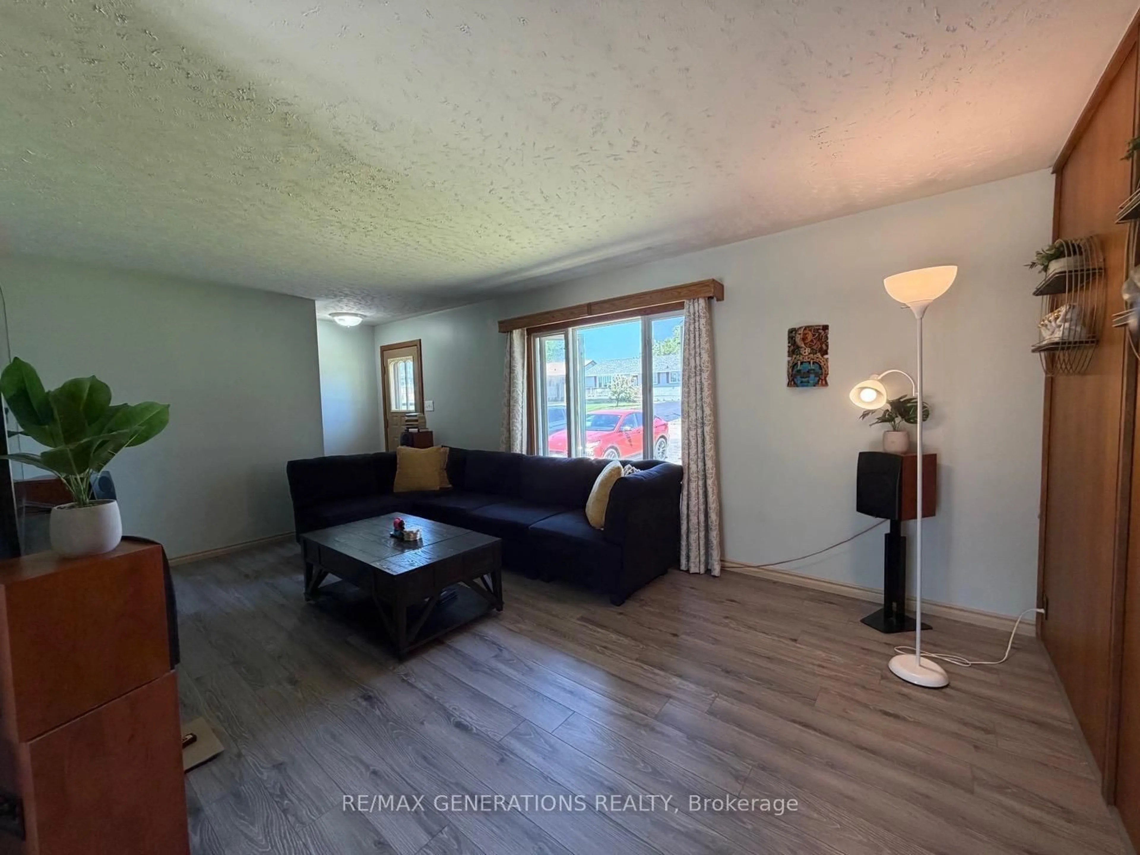 Living room with furniture, wood/laminate floor for 82 Lakeview Dr, Terrace Bay Ontario P0T 2W0