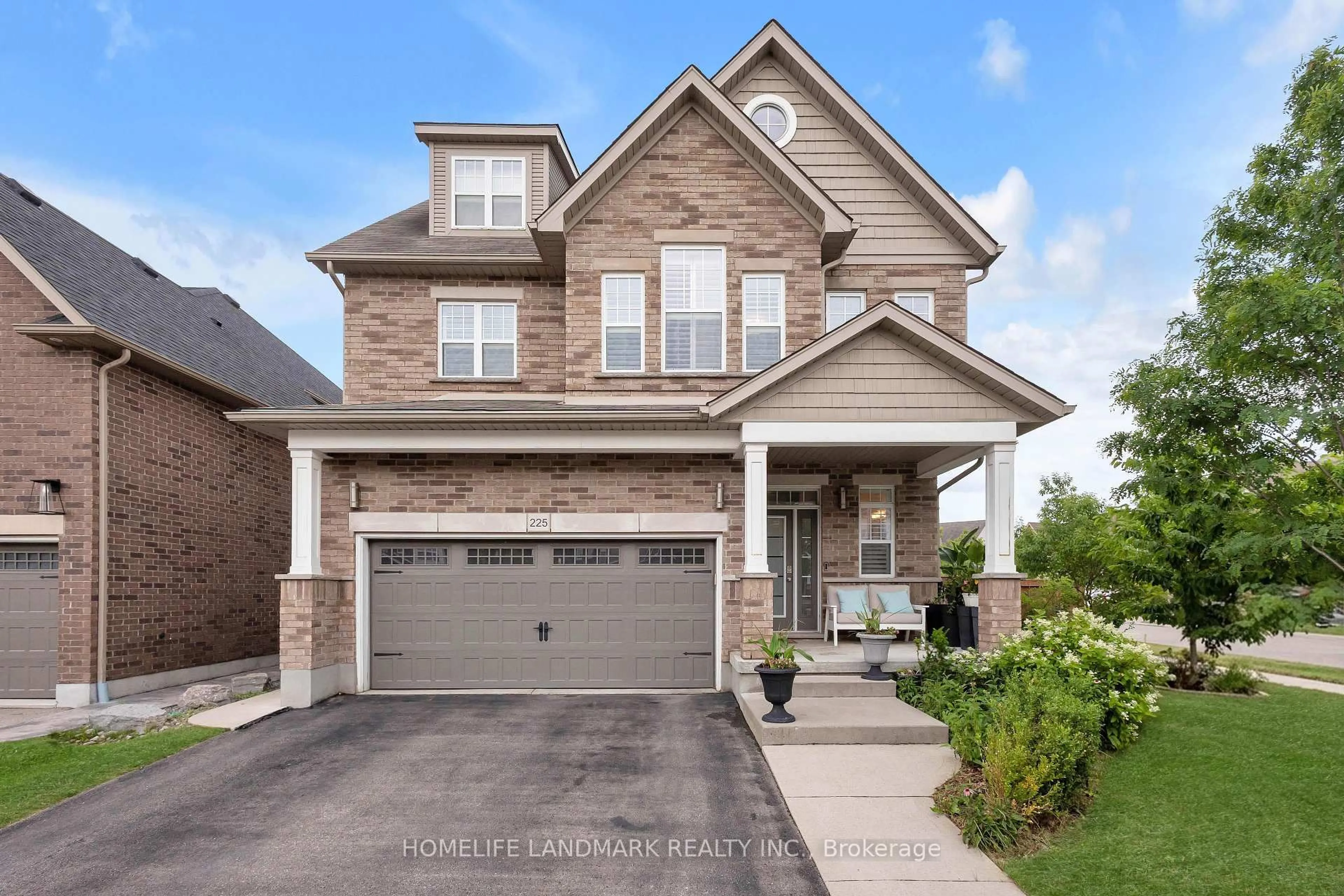 Home with brick exterior material, street for 225 TREMAINE Cres, Kitchener Ontario N2A 4L9