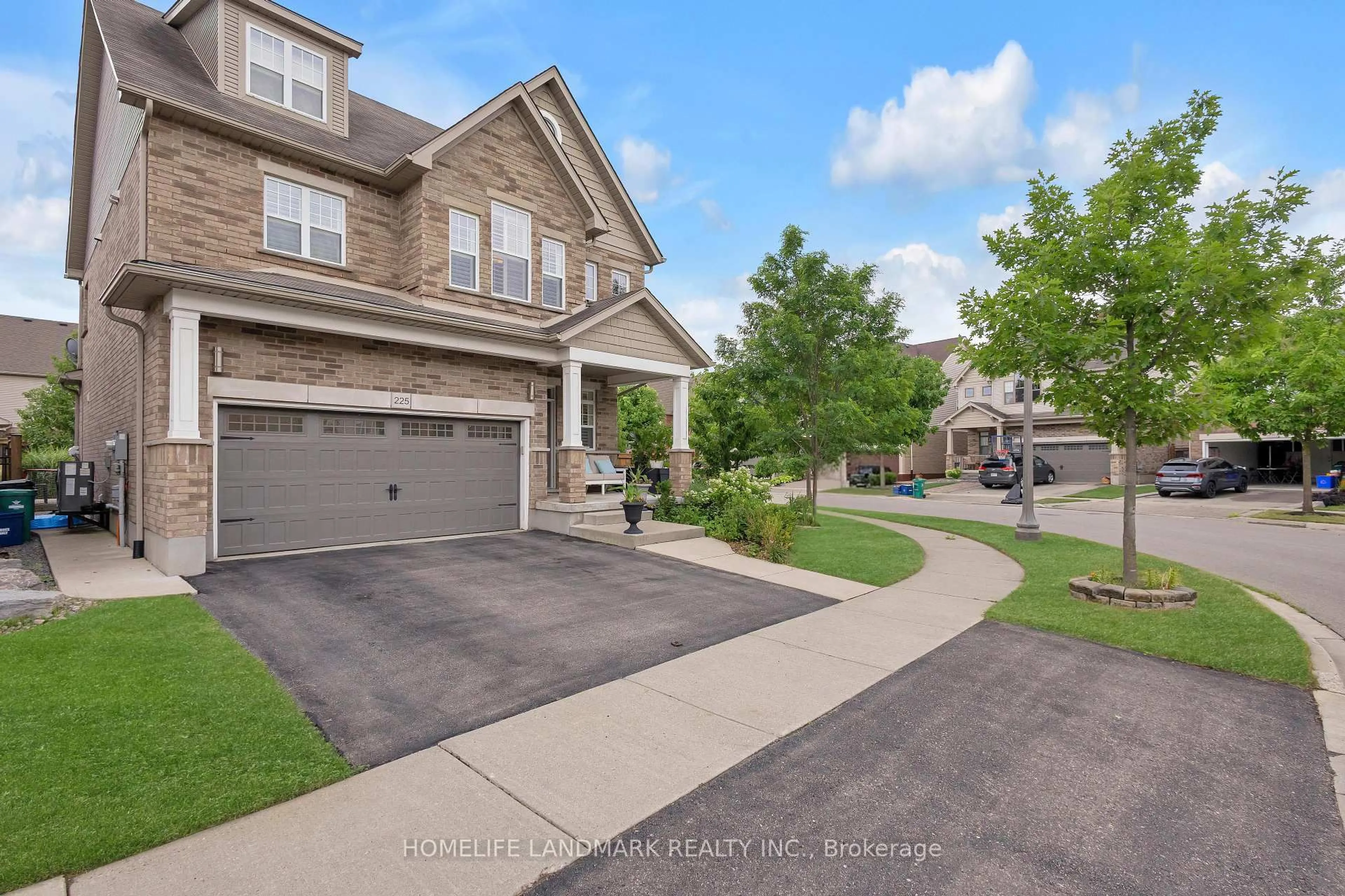 Home with brick exterior material, street for 225 TREMAINE Cres, Kitchener Ontario N2A 4L9