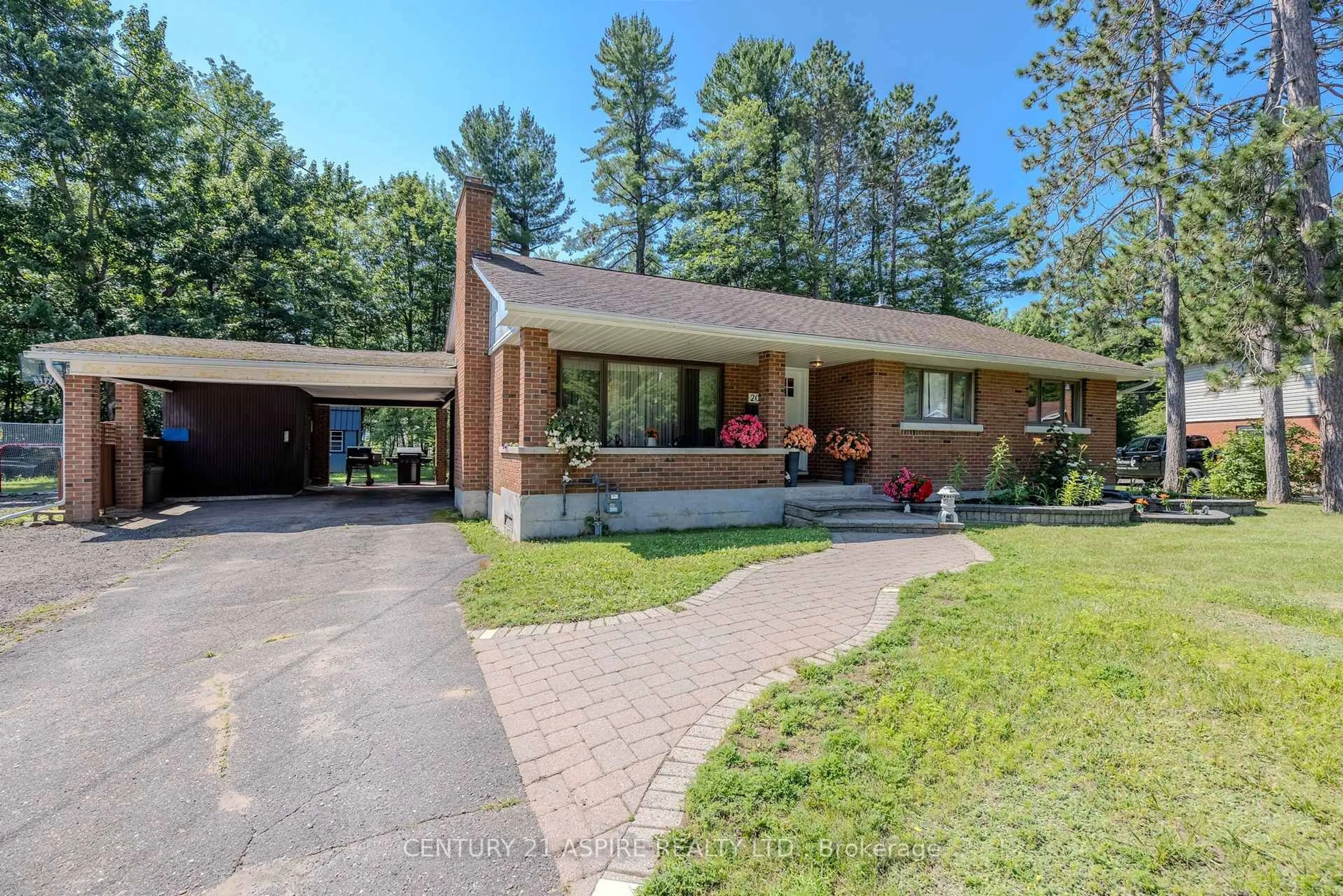 Home with brick exterior material, street for 20 Kramer Ave, Petawawa Ontario K8H 2A2