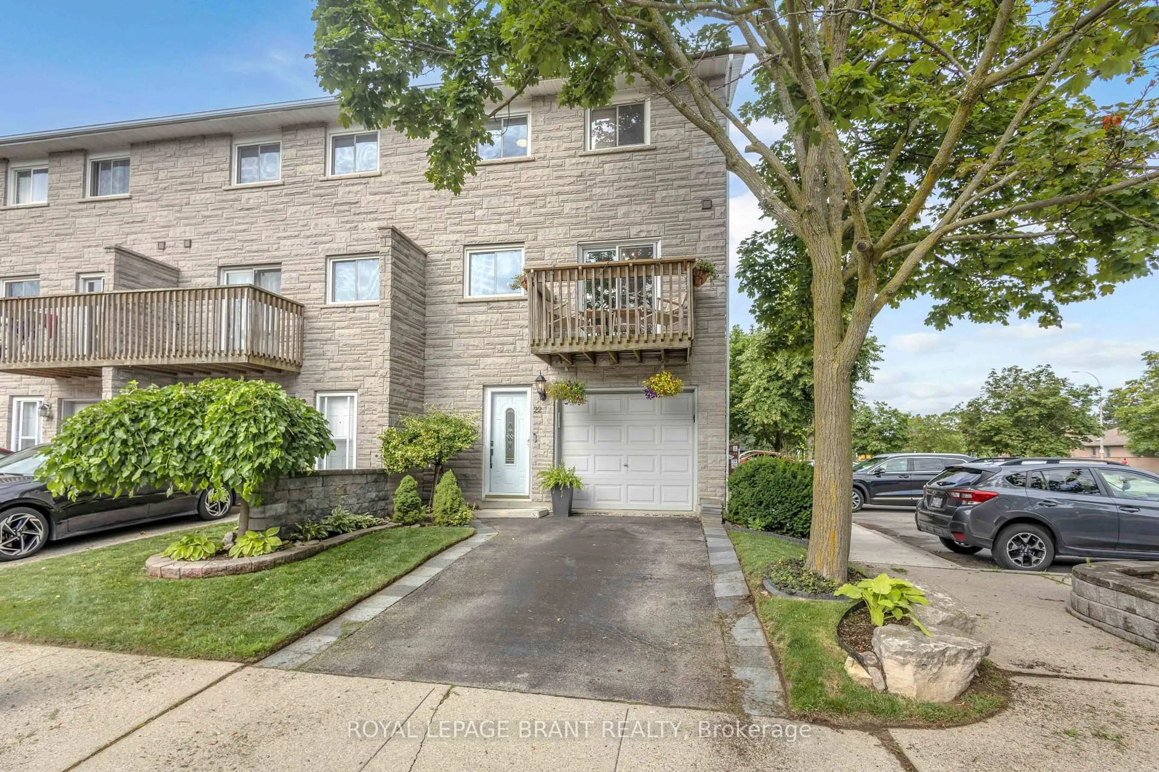 A pic from outside/outdoor area/front of a property/back of a property/a pic from drone, street for 1155 Paramount Dr #22, Hamilton Ontario L8J 2N4