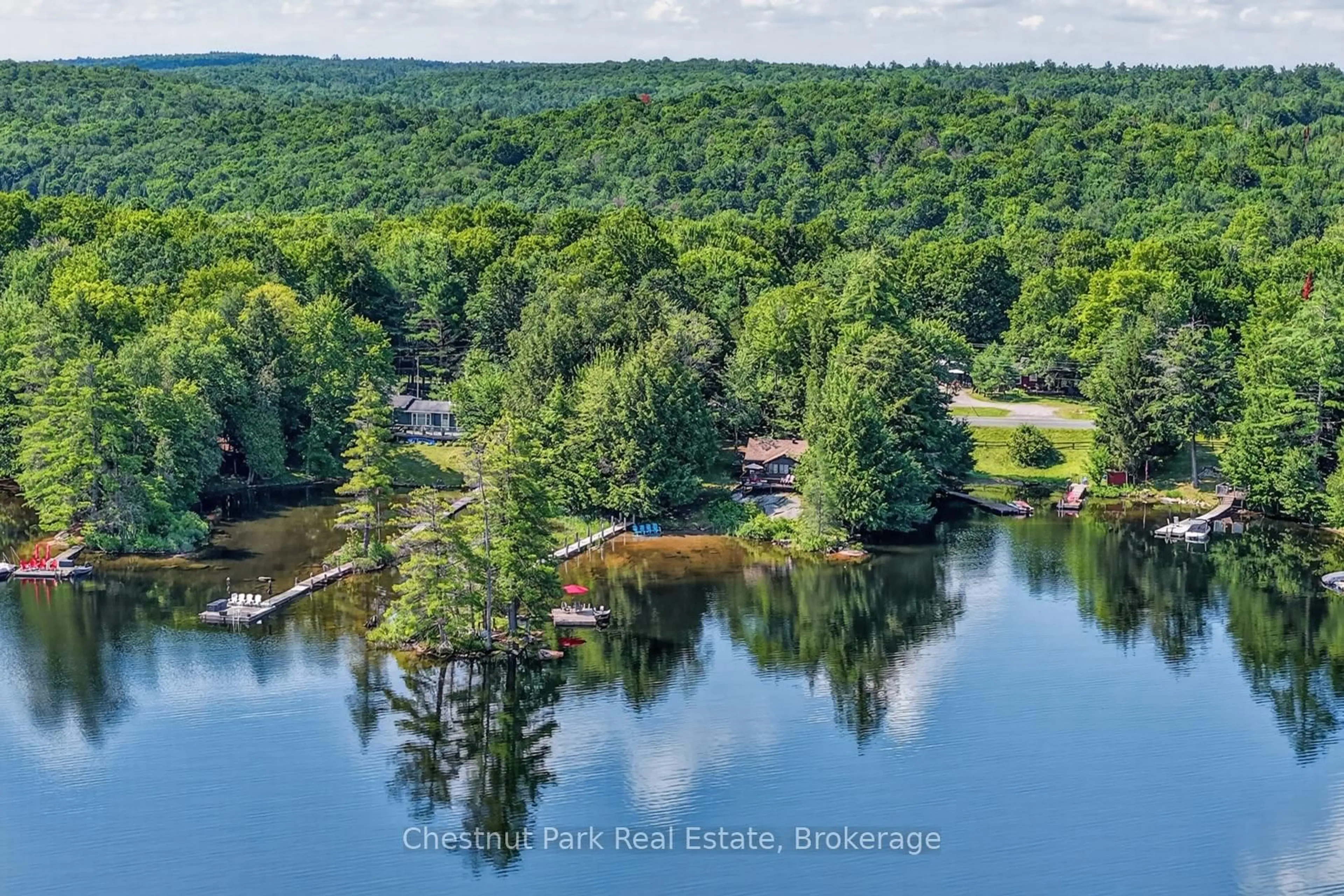 A pic from outside/outdoor area/front of a property/back of a property/a pic from drone, water/lake/river/ocean view for 1452 Kushog Lake Rd, Algonquin Highlands Ontario K0M 1S0