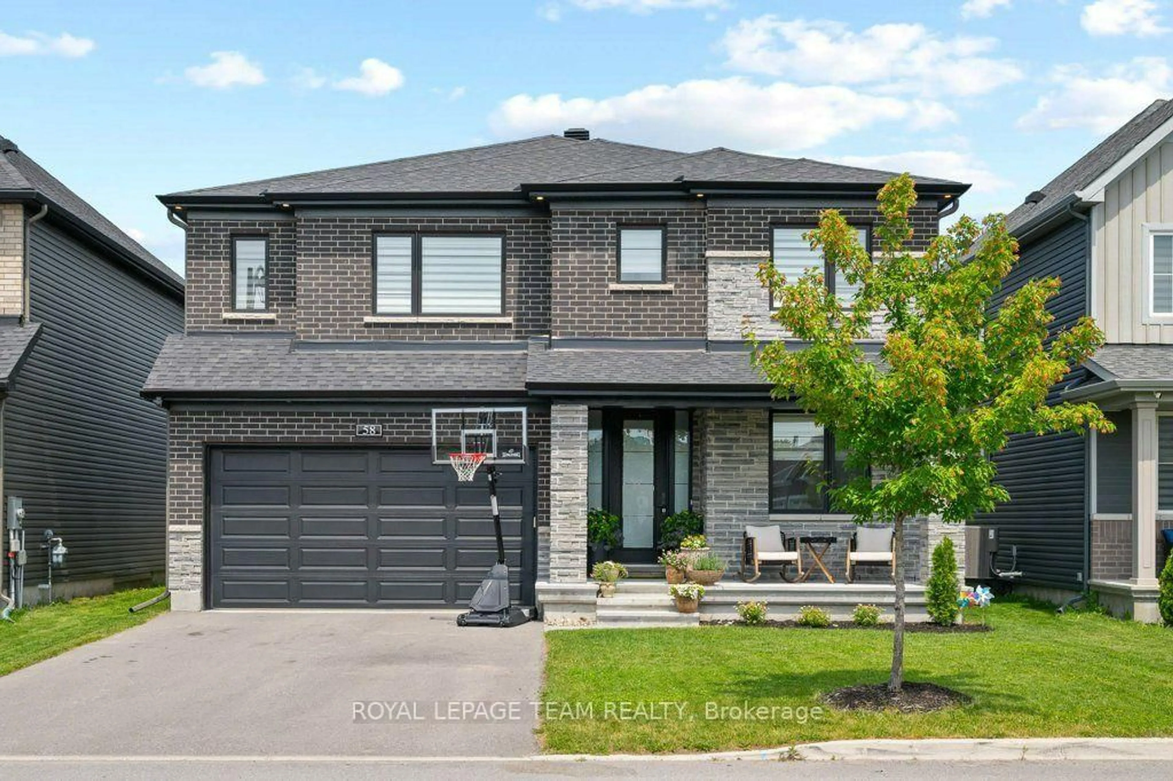 Home with brick exterior material, street for 58 Yacht Terr, Manotick Ontario K4M 0N3