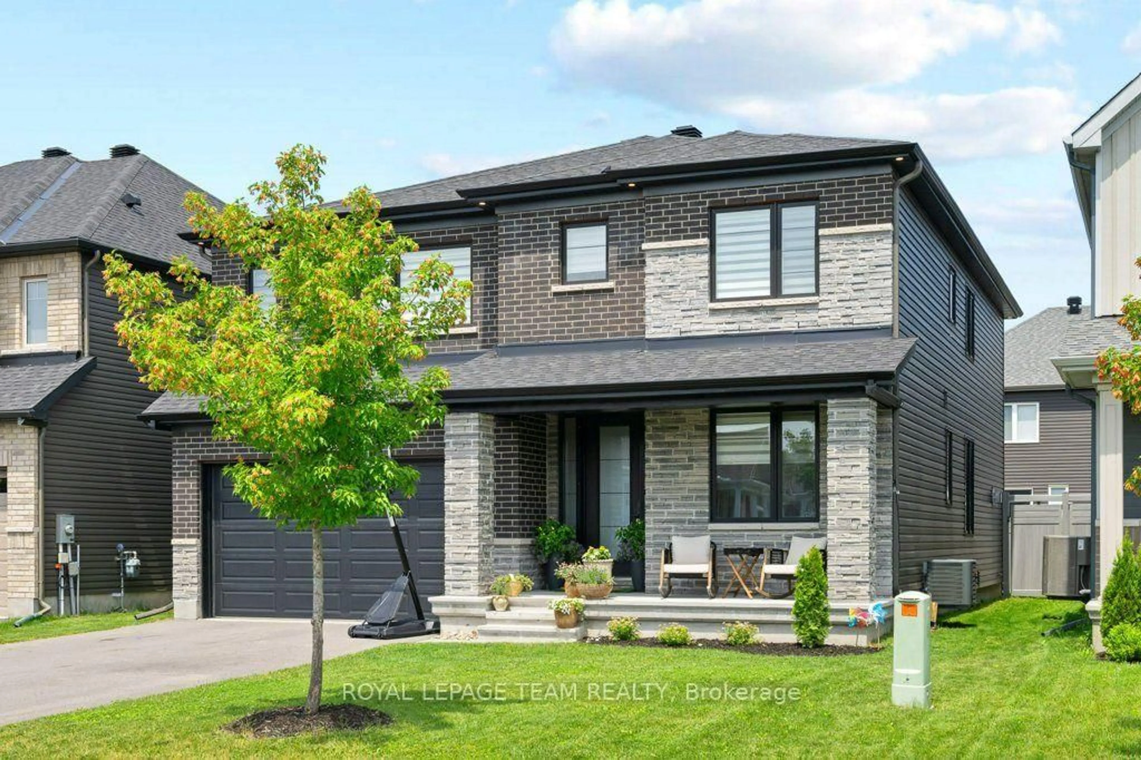 Home with brick exterior material, street for 58 Yacht Terr, Manotick Ontario K4M 0N3