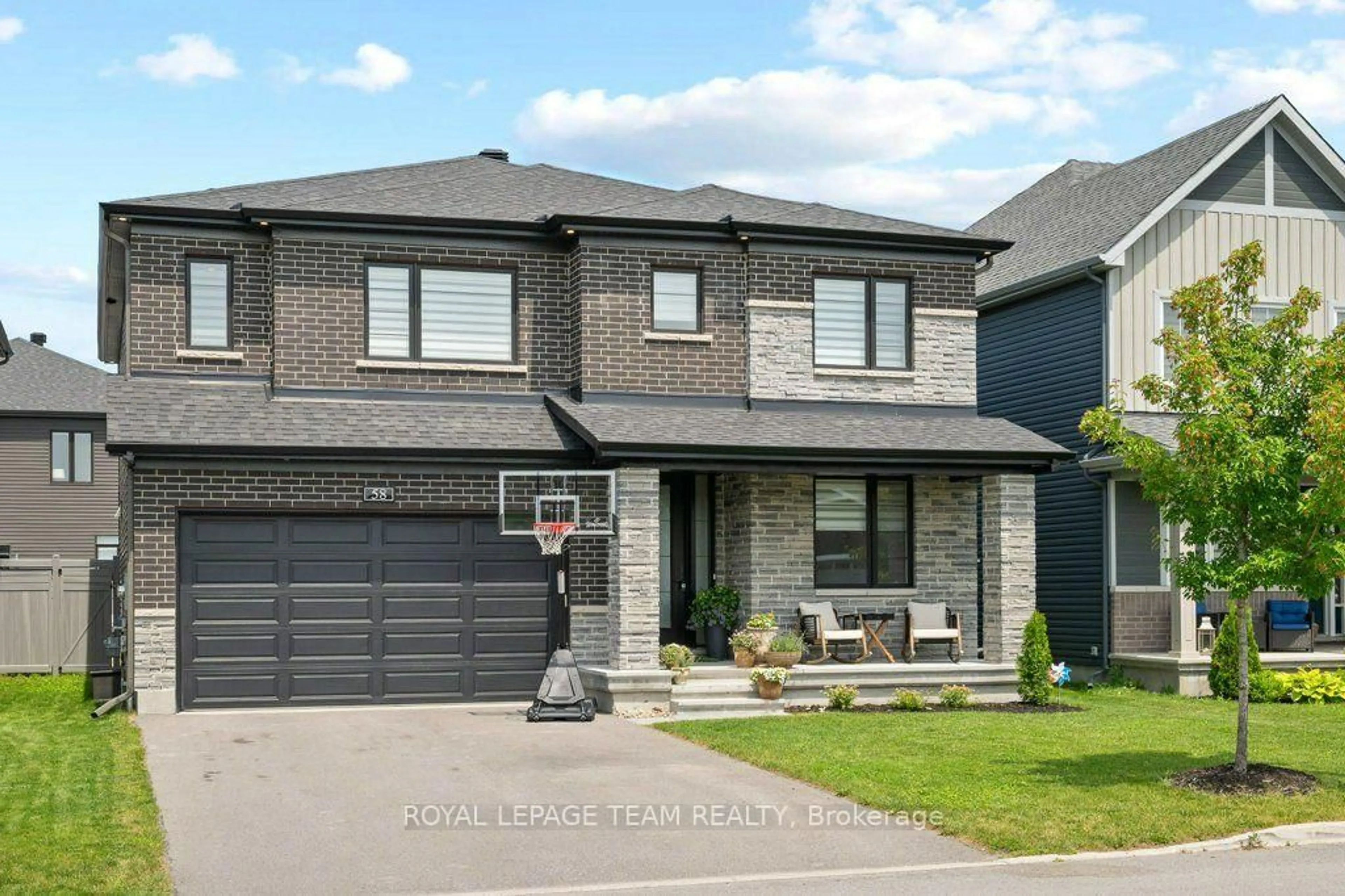 Home with brick exterior material, street for 58 Yacht Terr, Manotick Ontario K4M 0N3