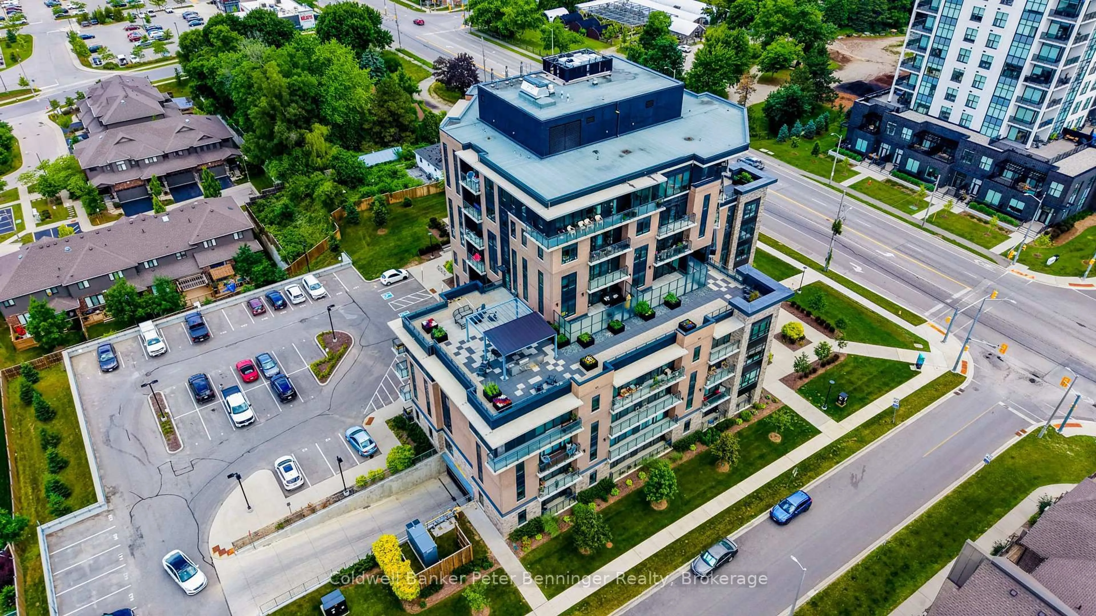 A pic from outside/outdoor area/front of a property/back of a property/a pic from drone, building for 332 Gosling Gdns #104, Guelph Ontario N1L 0P8