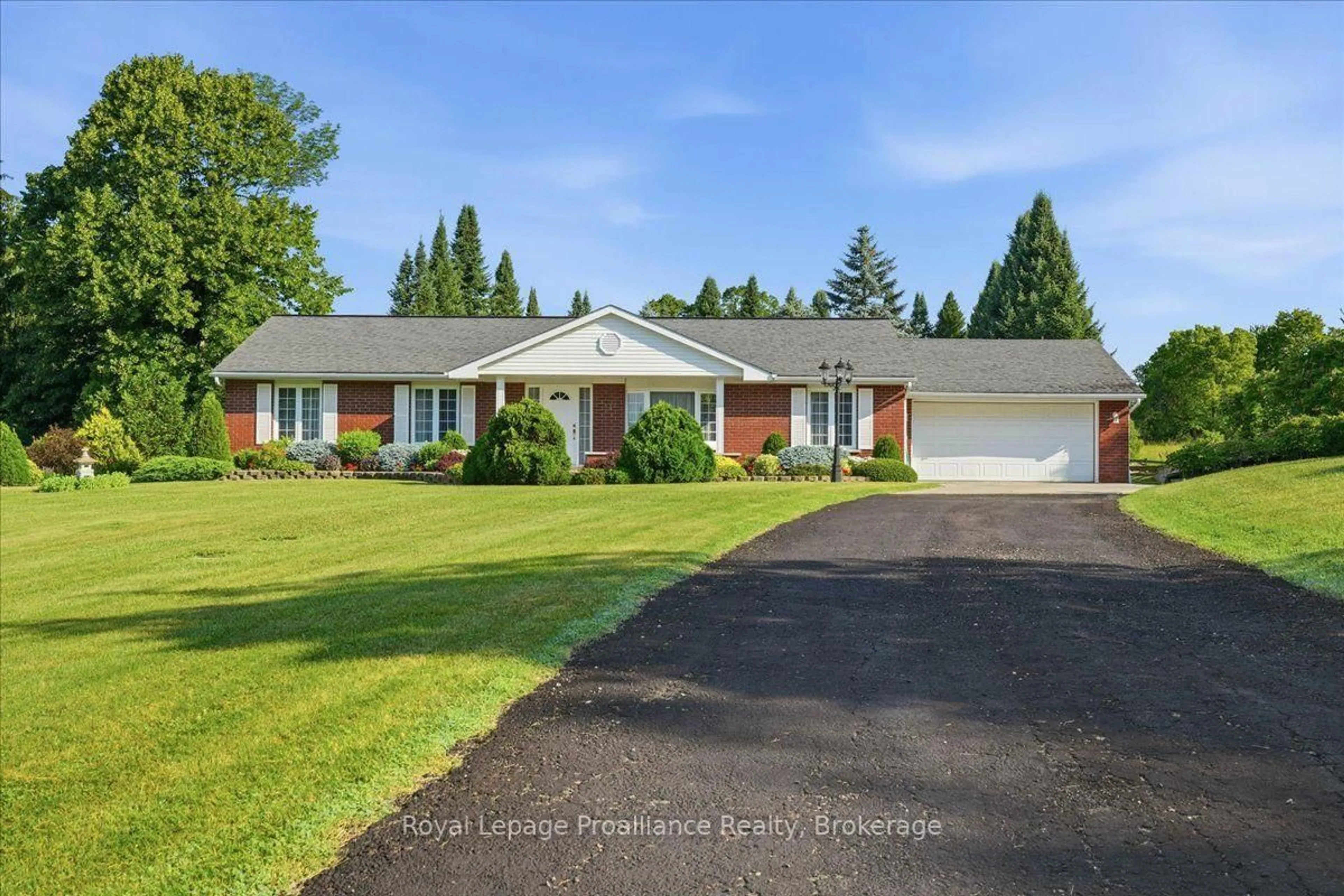 A pic from outside/outdoor area/front of a property/back of a property/a pic from drone, street for 81 Old Troy Rd, Tweed Ontario K0K 3J0