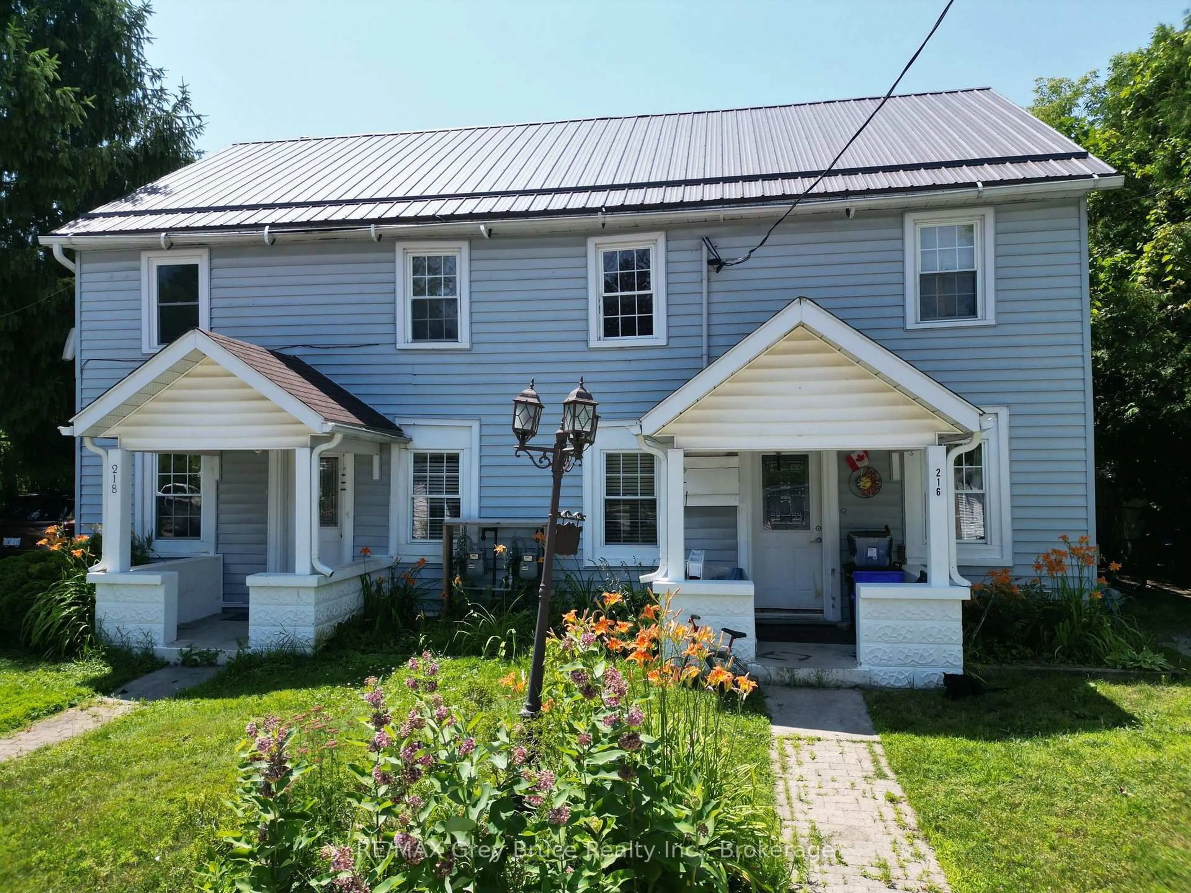 A pic from outside/outdoor area/front of a property/back of a property/a pic from drone, street for 216/218 Denmark St, Meaford Ontario N4L 1C2