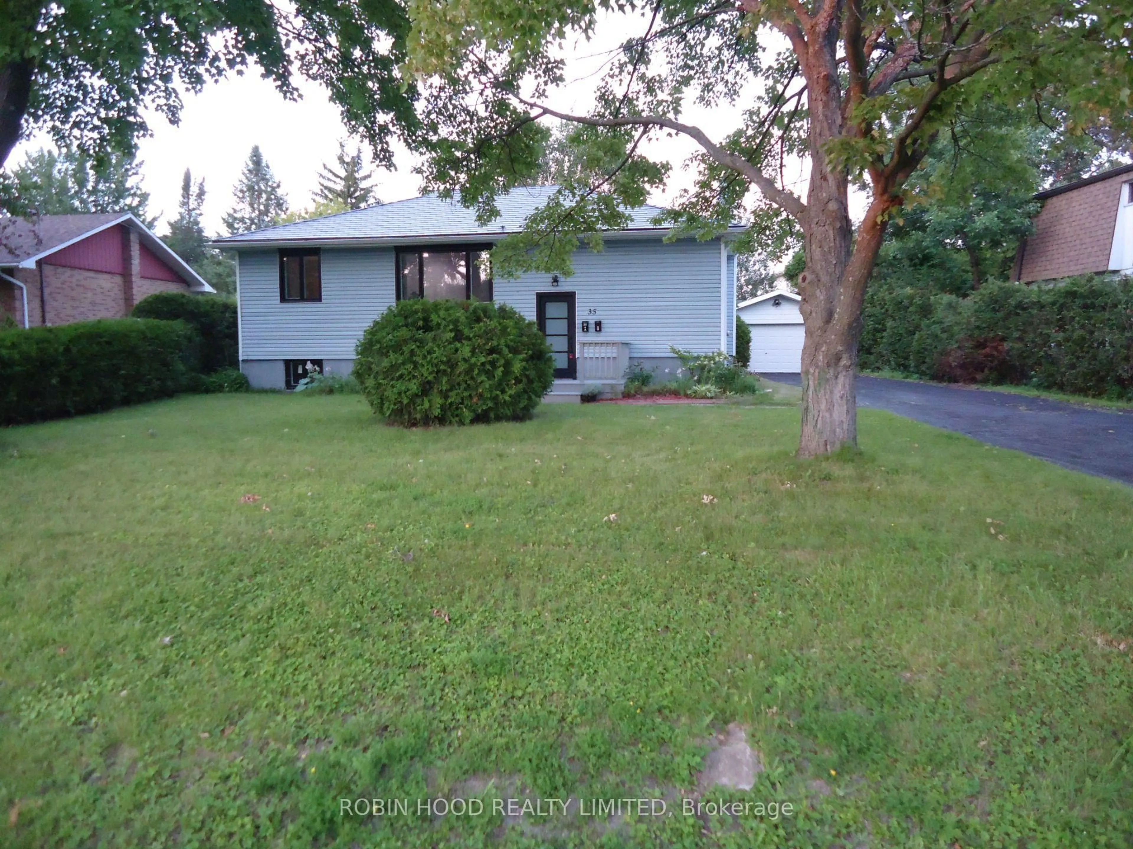 A pic from outside/outdoor area/front of a property/back of a property/a pic from drone, street for 35 Tauvette St #NA, Ottawa Ontario K1B 3A1