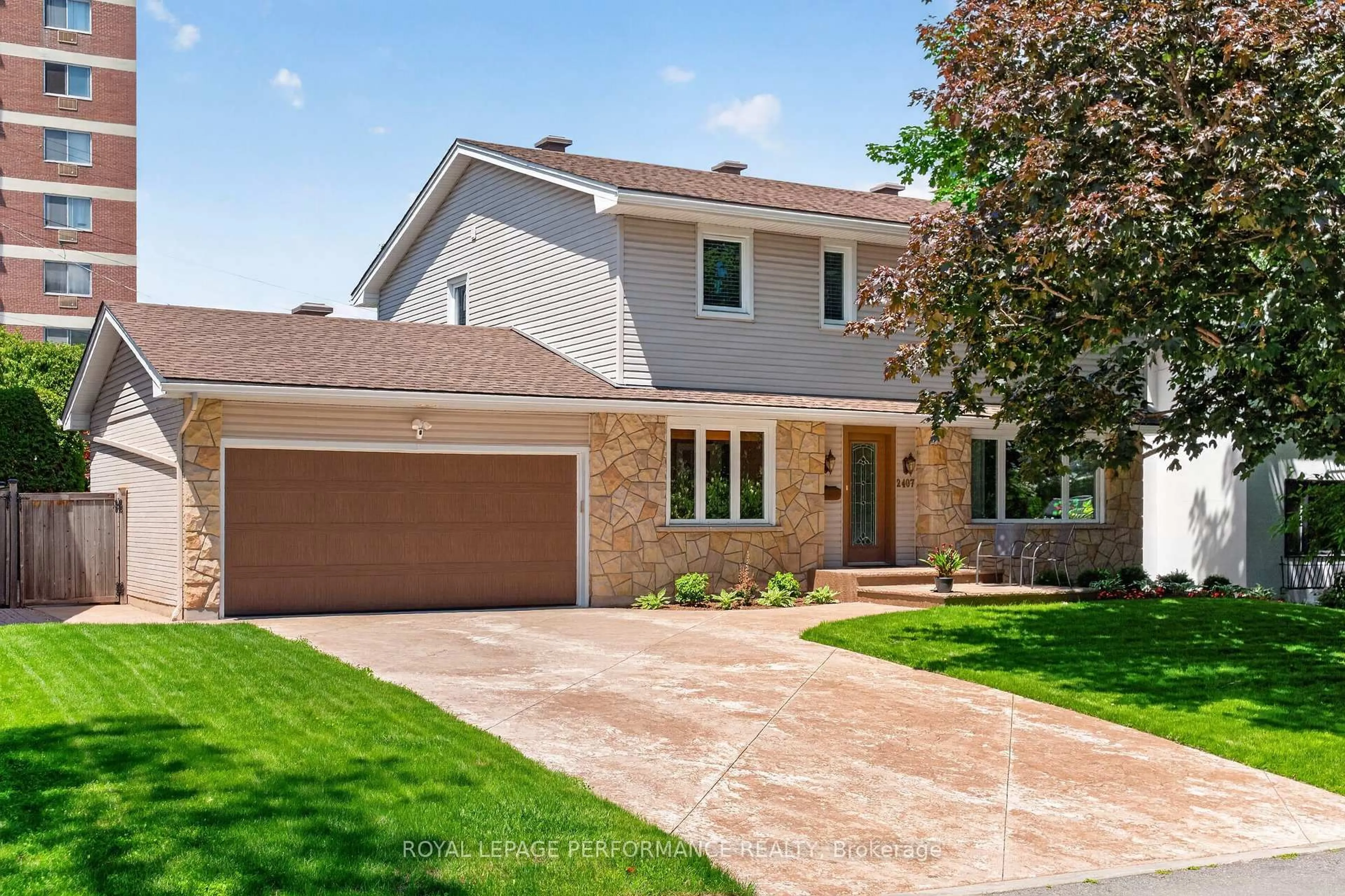 Home with brick exterior material, street for 2407 Rosewood Ave, Ottawa Ontario K2B 7L3