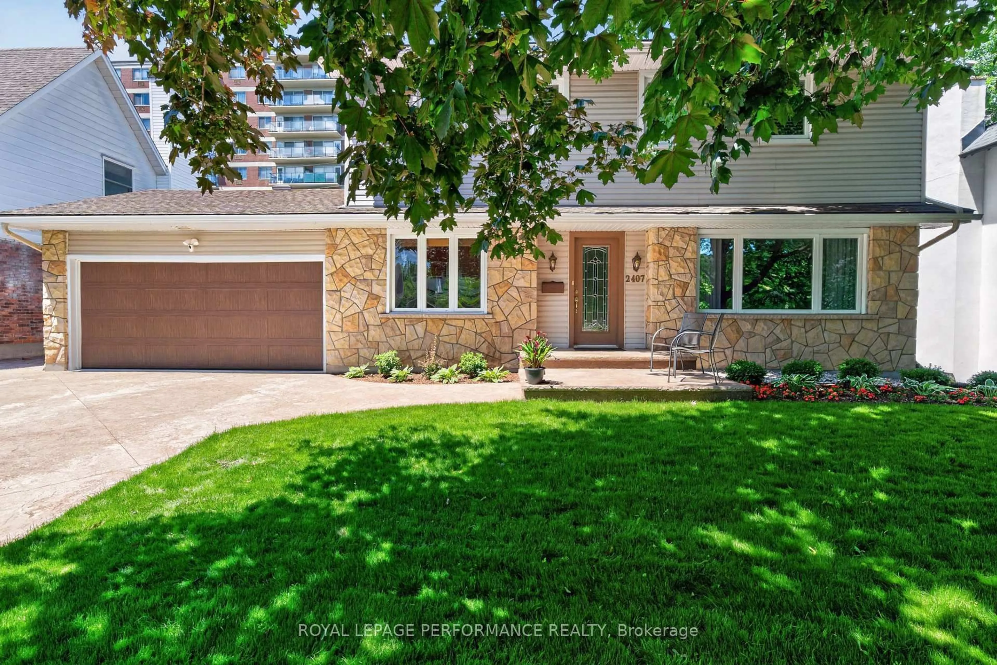 Home with brick exterior material, street for 2407 Rosewood Ave, Ottawa Ontario K2B 7L3