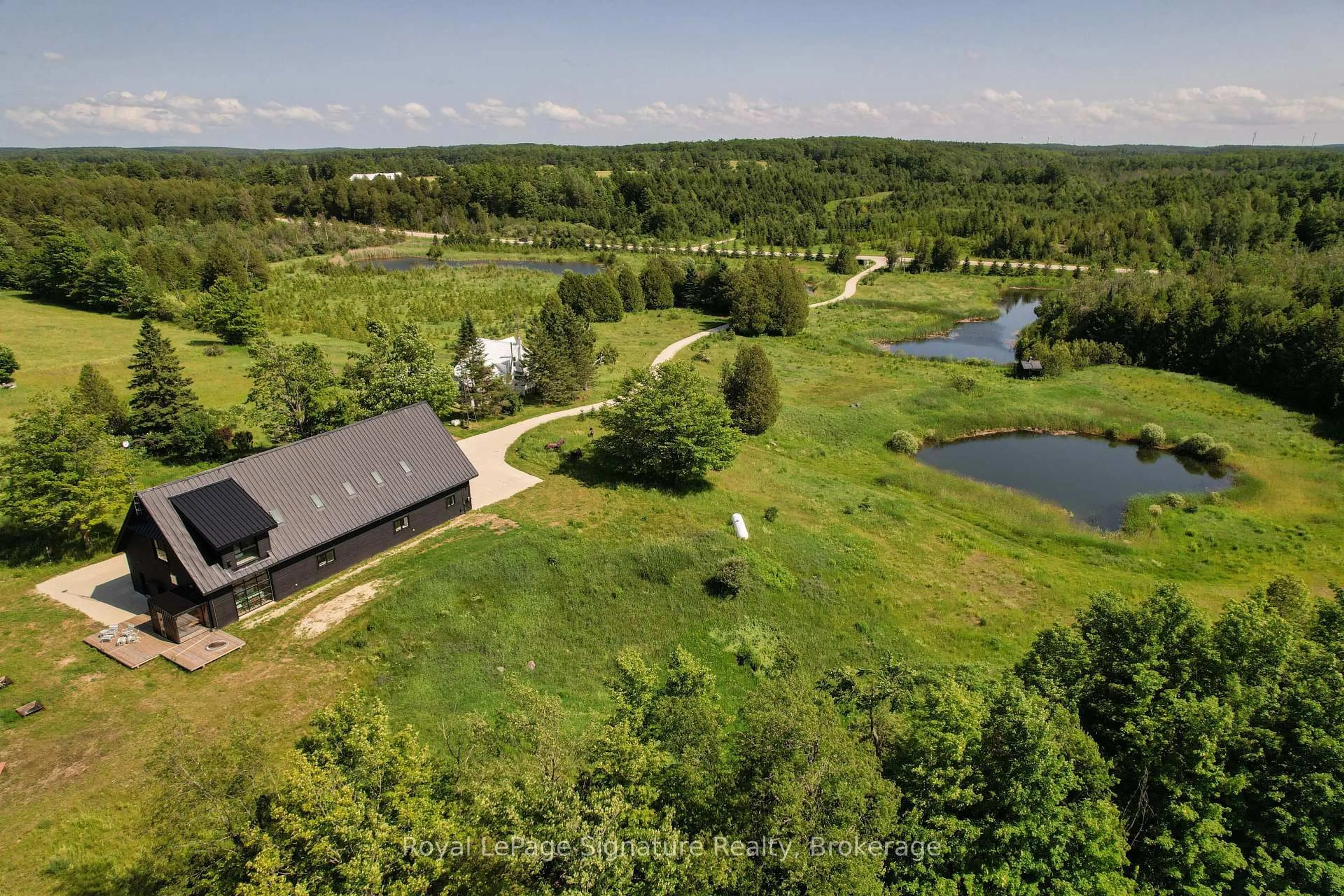 A pic from outside/outdoor area/front of a property/back of a property/a pic from drone, water/lake/river/ocean view for 469319 Grey Rd 31 Rd, Grey Highlands Ontario N0C 1M0