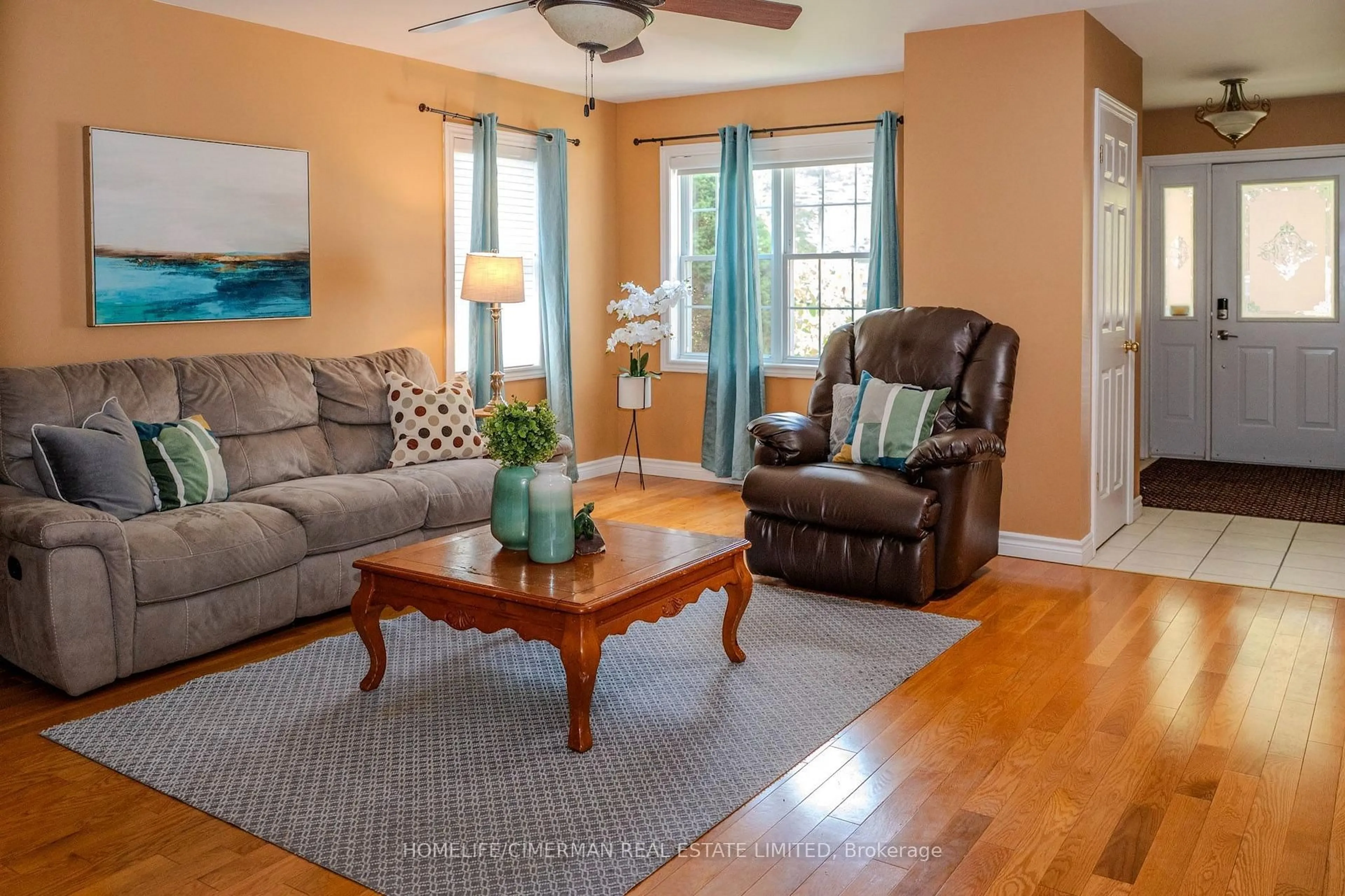 Living room with furniture, wood/laminate floor for 171 Main St, Kawartha Lakes Ontario K0M 1A0