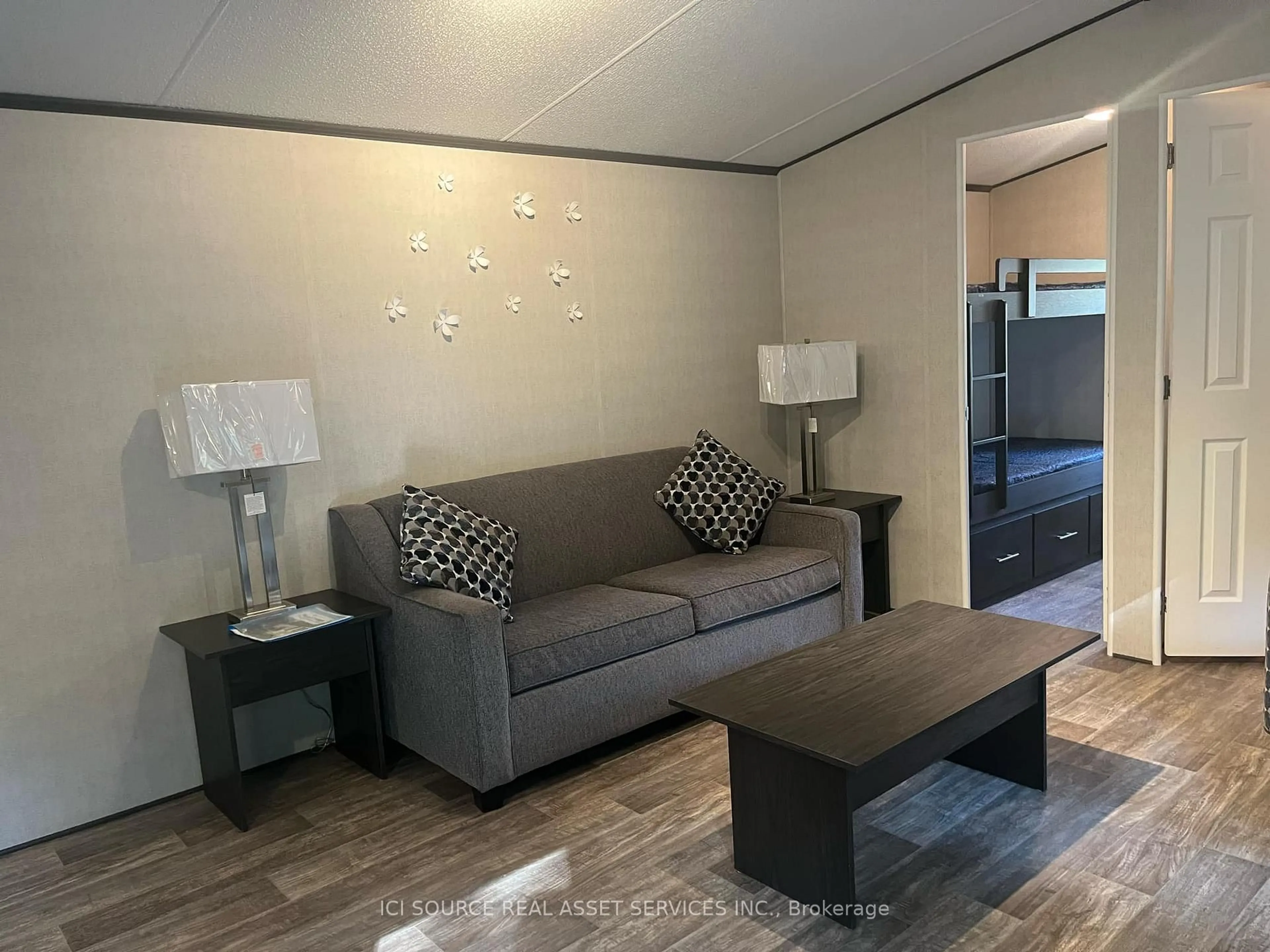 Living room with furniture, unknown for 1047 Bonnie Lake Camp Rd #MB235, Bracebridge Ontario P1L 1W9