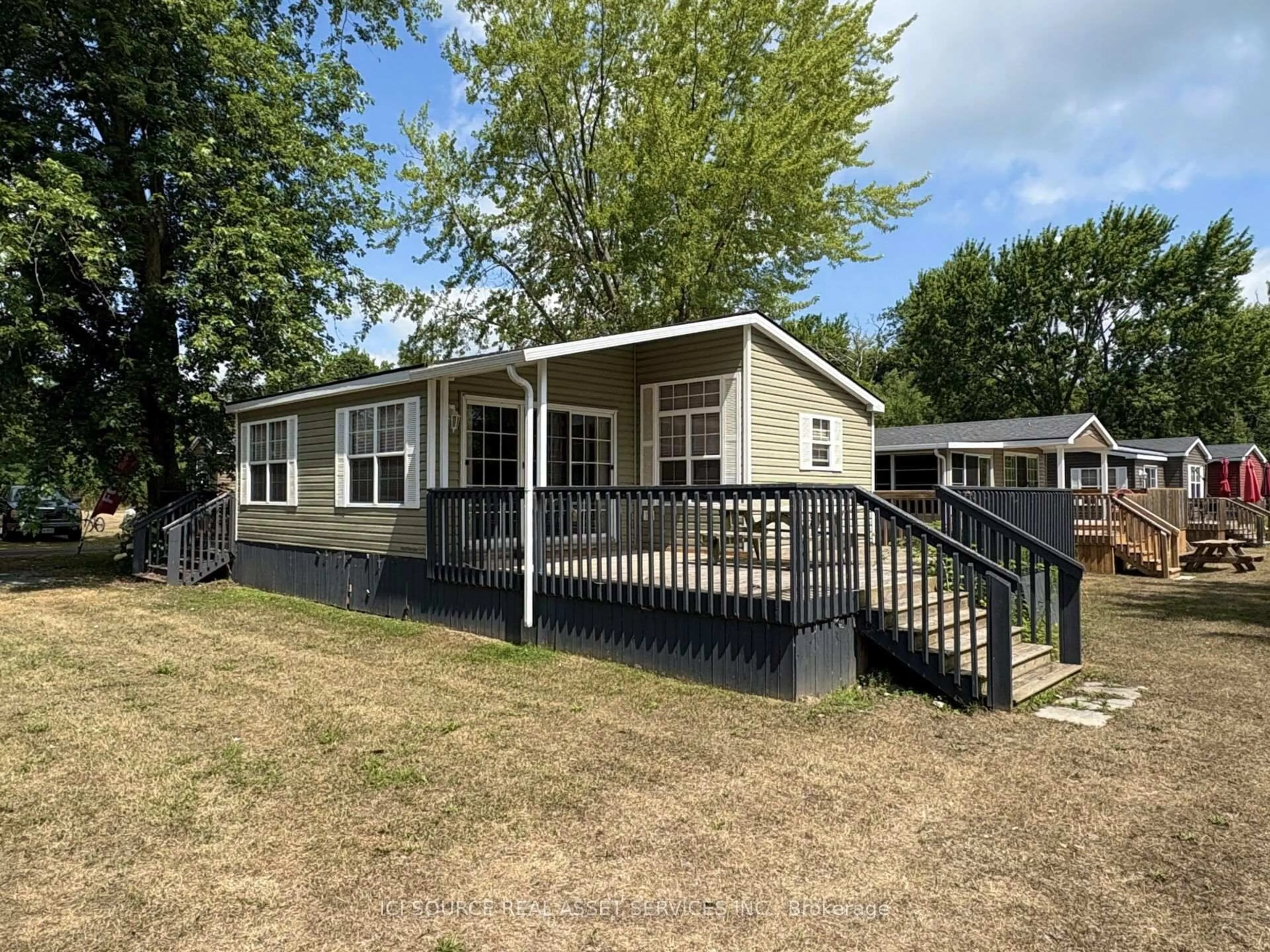 A pic from outside/outdoor area/front of a property/back of a property/a pic from drone, unknown for 486 County Road 18 #DDCB18, Prince Edward County Ontario K0K 1P0