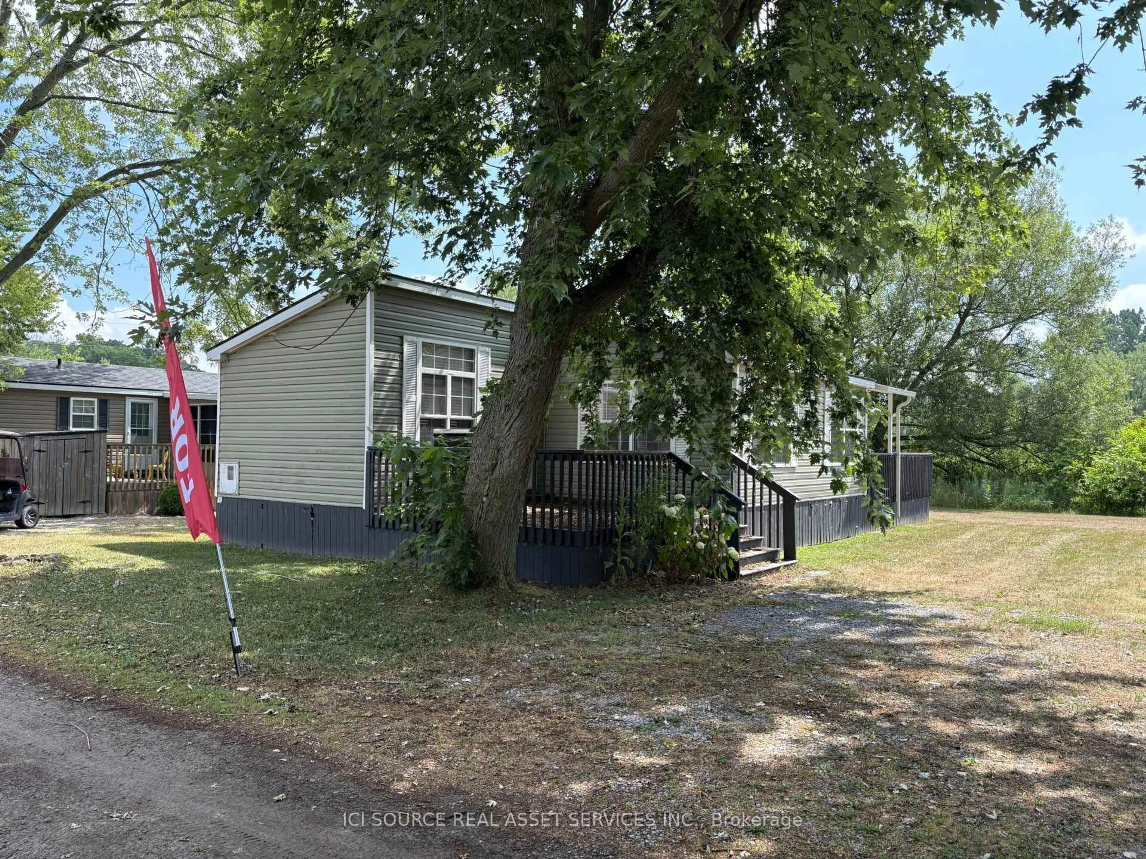 A pic from outside/outdoor area/front of a property/back of a property/a pic from drone, street for 486 County Road 18 #DDCB18, Prince Edward County Ontario K0K 1P0