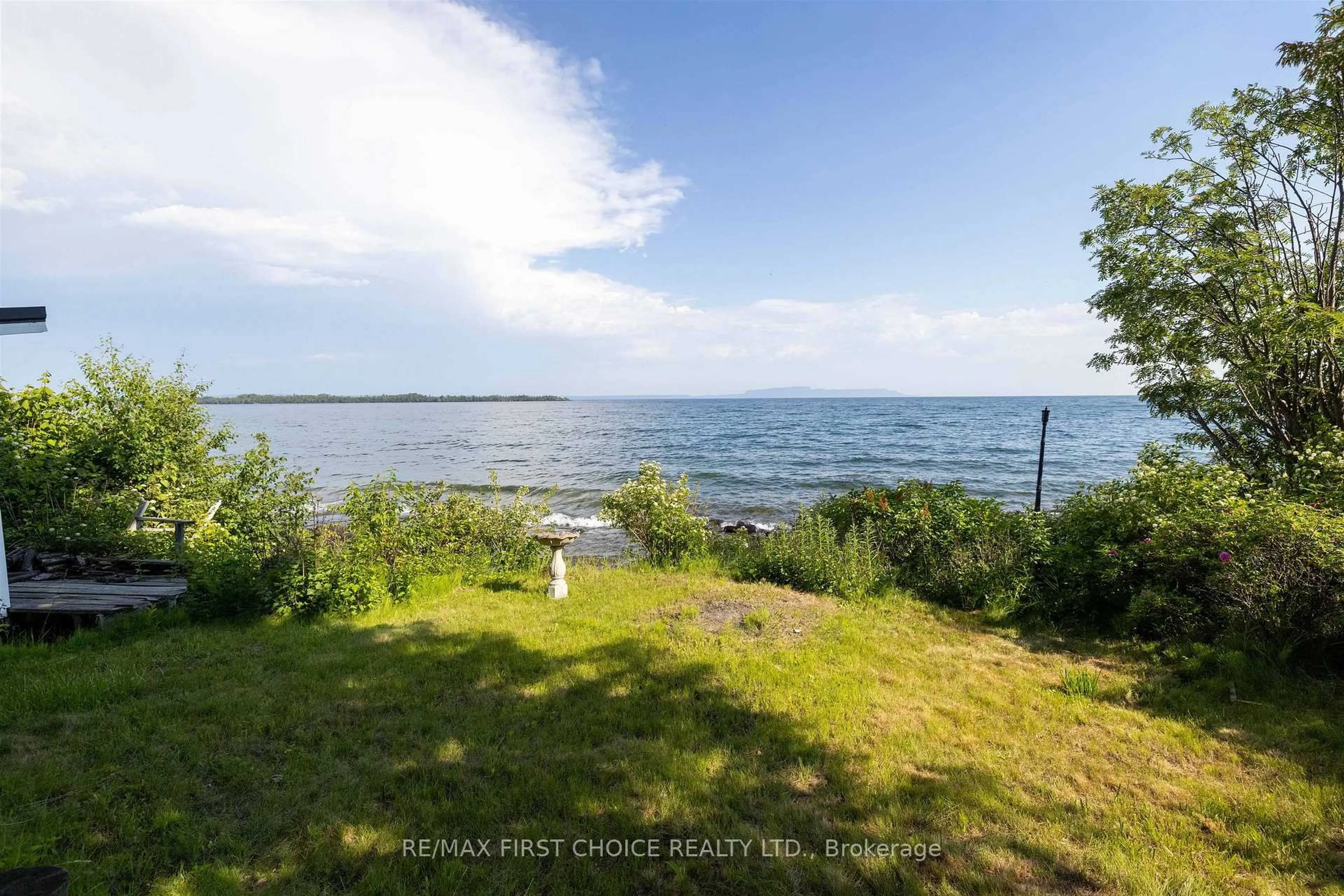 A pic from outside/outdoor area/front of a property/back of a property/a pic from drone, water/lake/river/ocean view for 1185 Sunrise Beach Rd, Shuniah Ontario P7A 0Z5