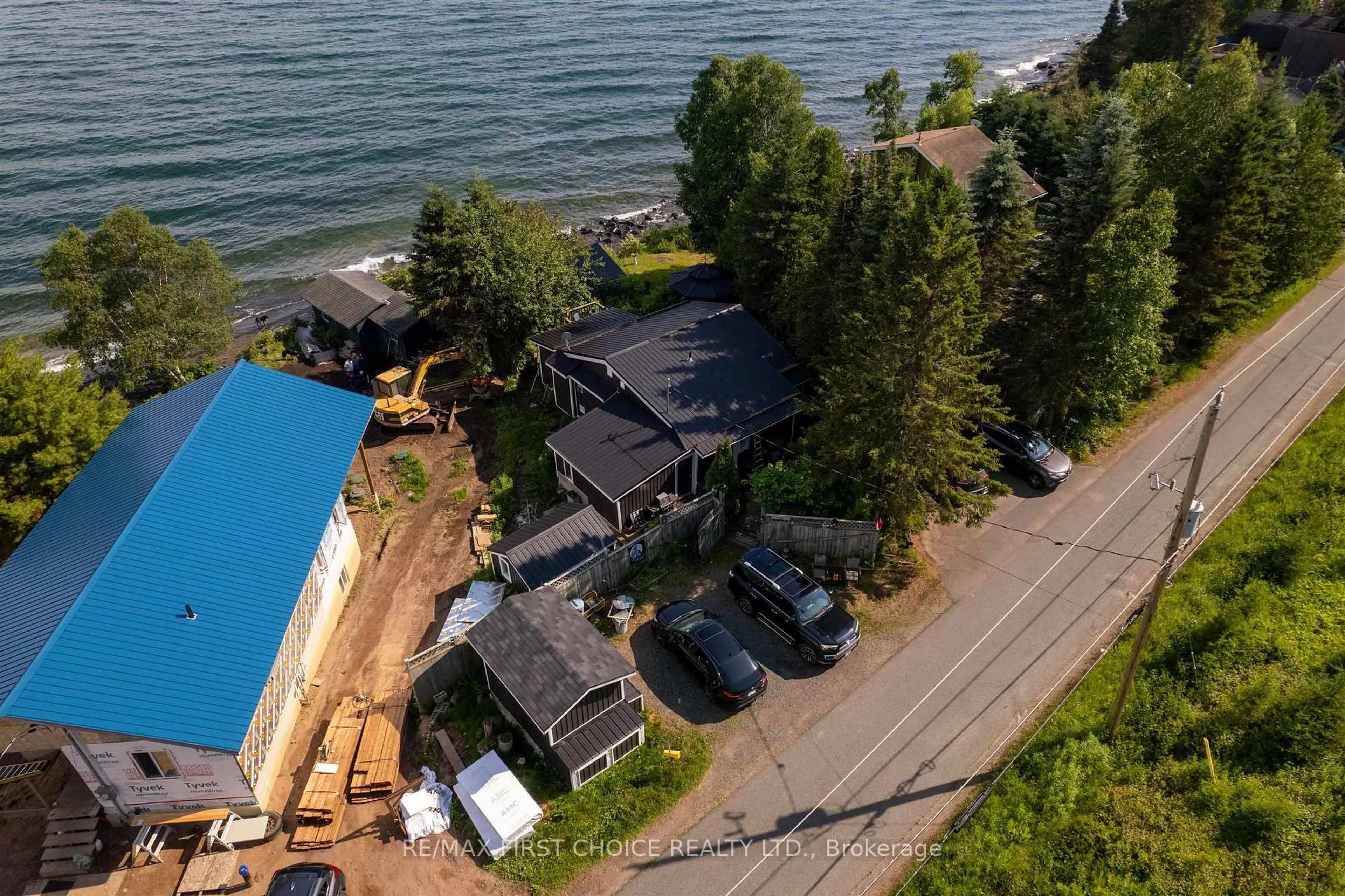 A pic from outside/outdoor area/front of a property/back of a property/a pic from drone, water/lake/river/ocean view for 1185 Sunrise Beach Rd, Shuniah Ontario P7A 0Z5