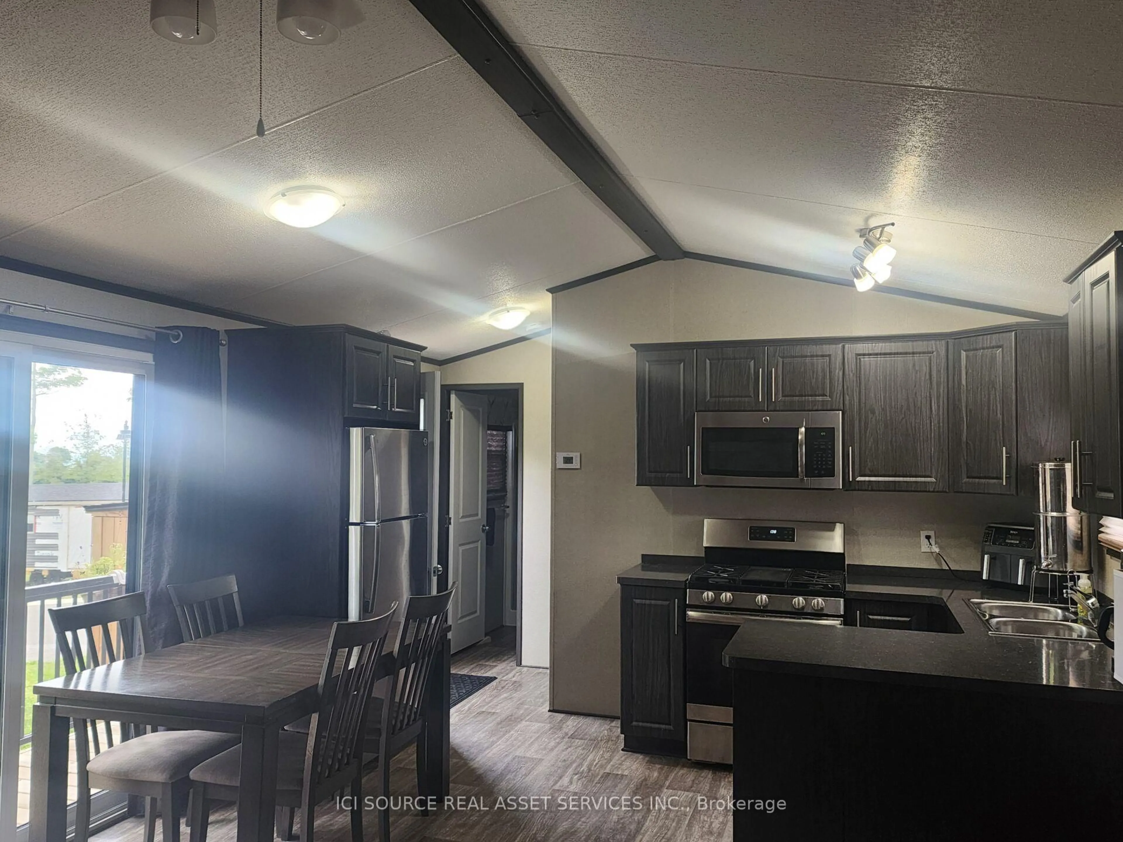 Open concept kitchen, unknown for 1235 Villiers Line #CLBW32, Otonabee-South Monaghan Ontario K0L 2G0