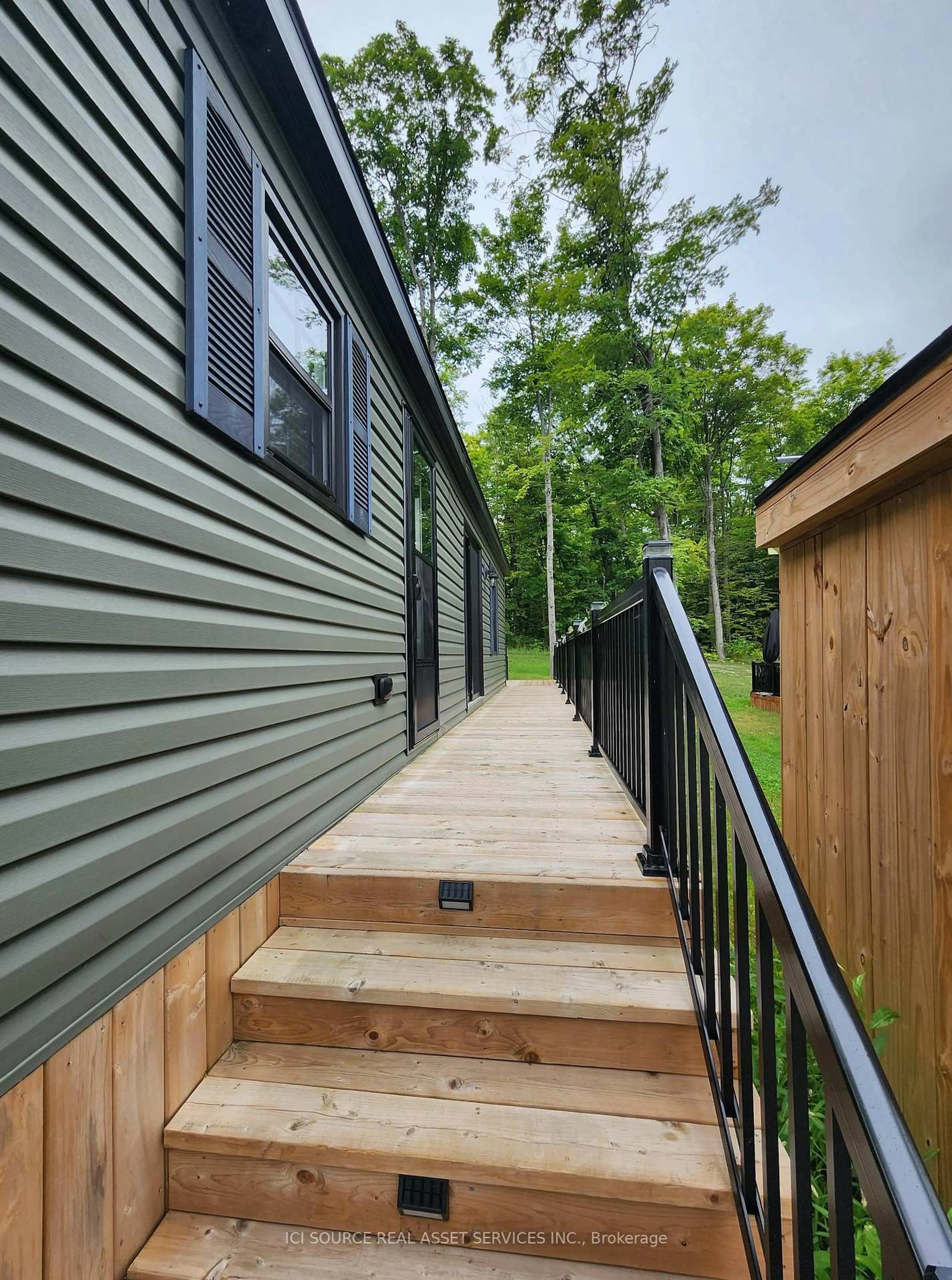 Home with vinyl exterior material, street for 1235 Villiers Line #CLBW32, Otonabee-South Monaghan Ontario K0L 2G0
