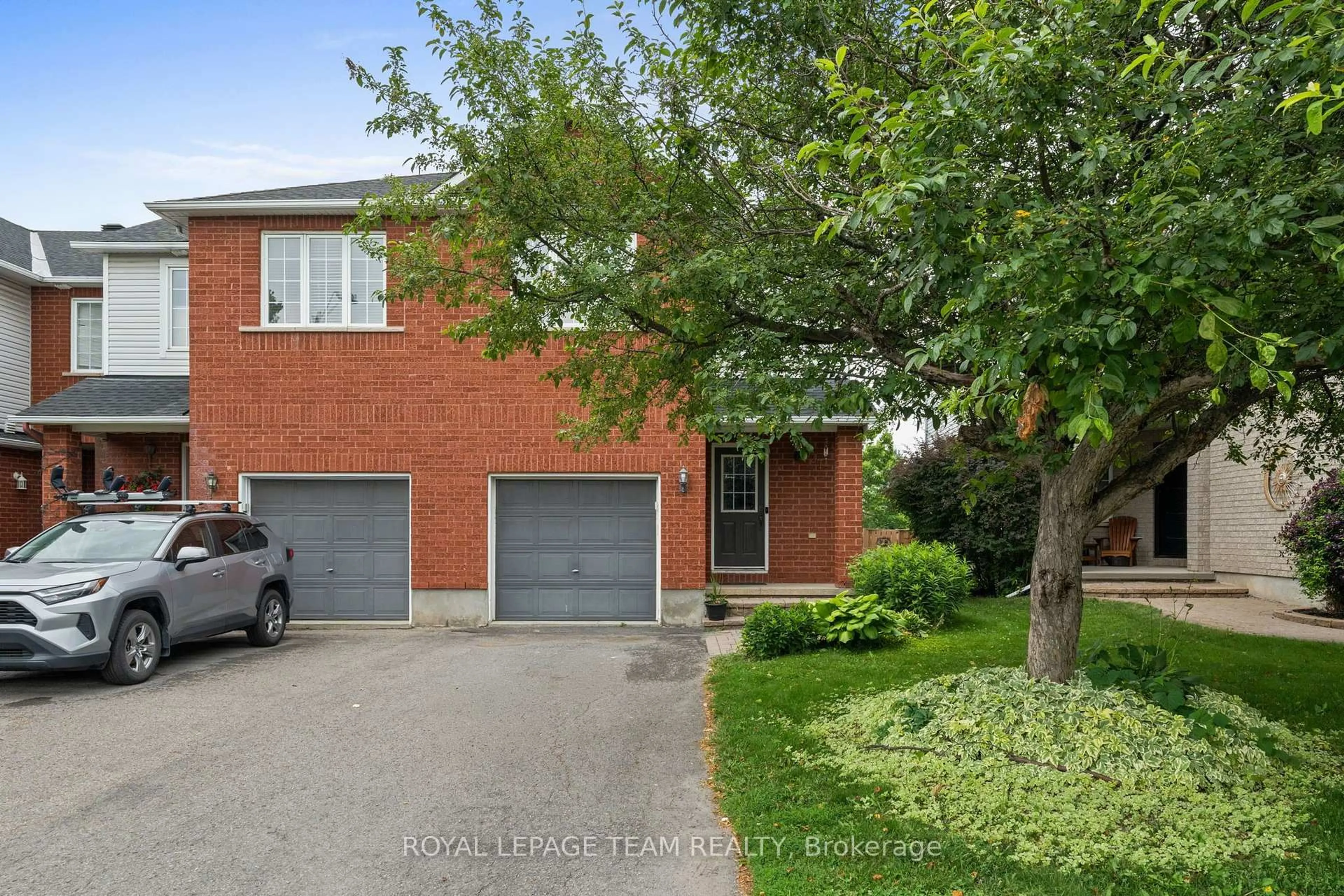 Home with brick exterior material, street for 937 Goose River Ave, Ottawa Ontario K1V 1T7