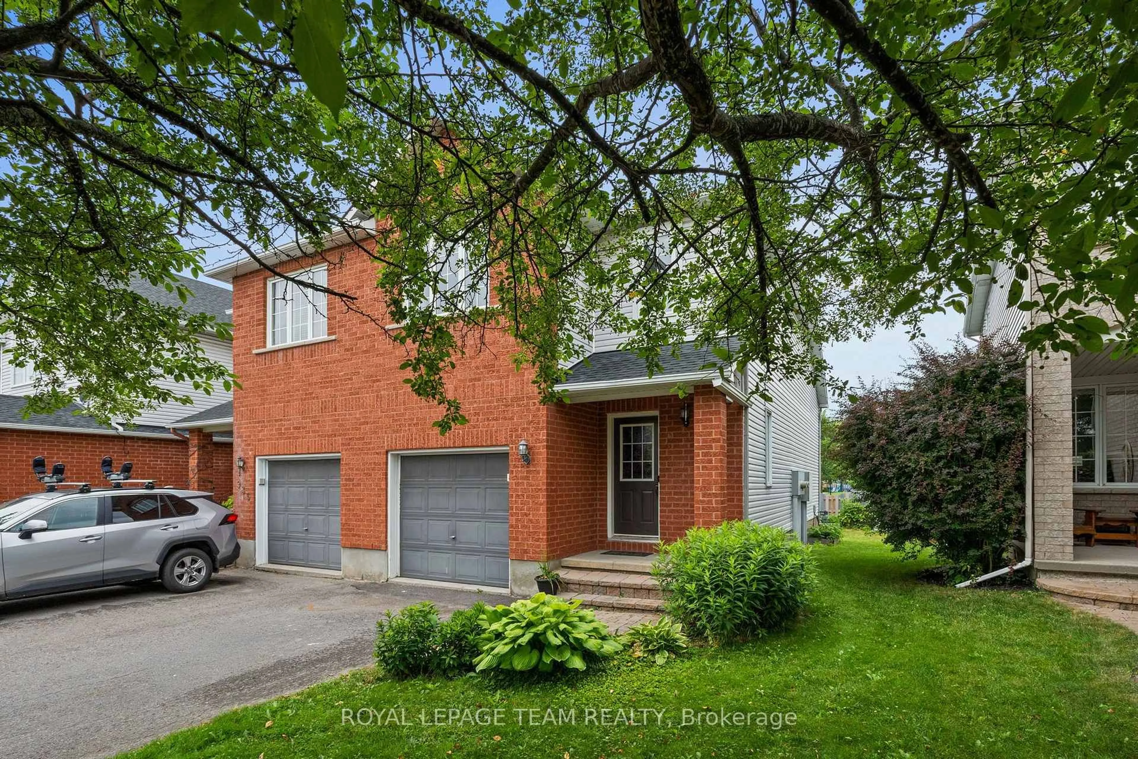 Home with brick exterior material, street for 937 Goose River Ave, Ottawa Ontario K1V 1T7