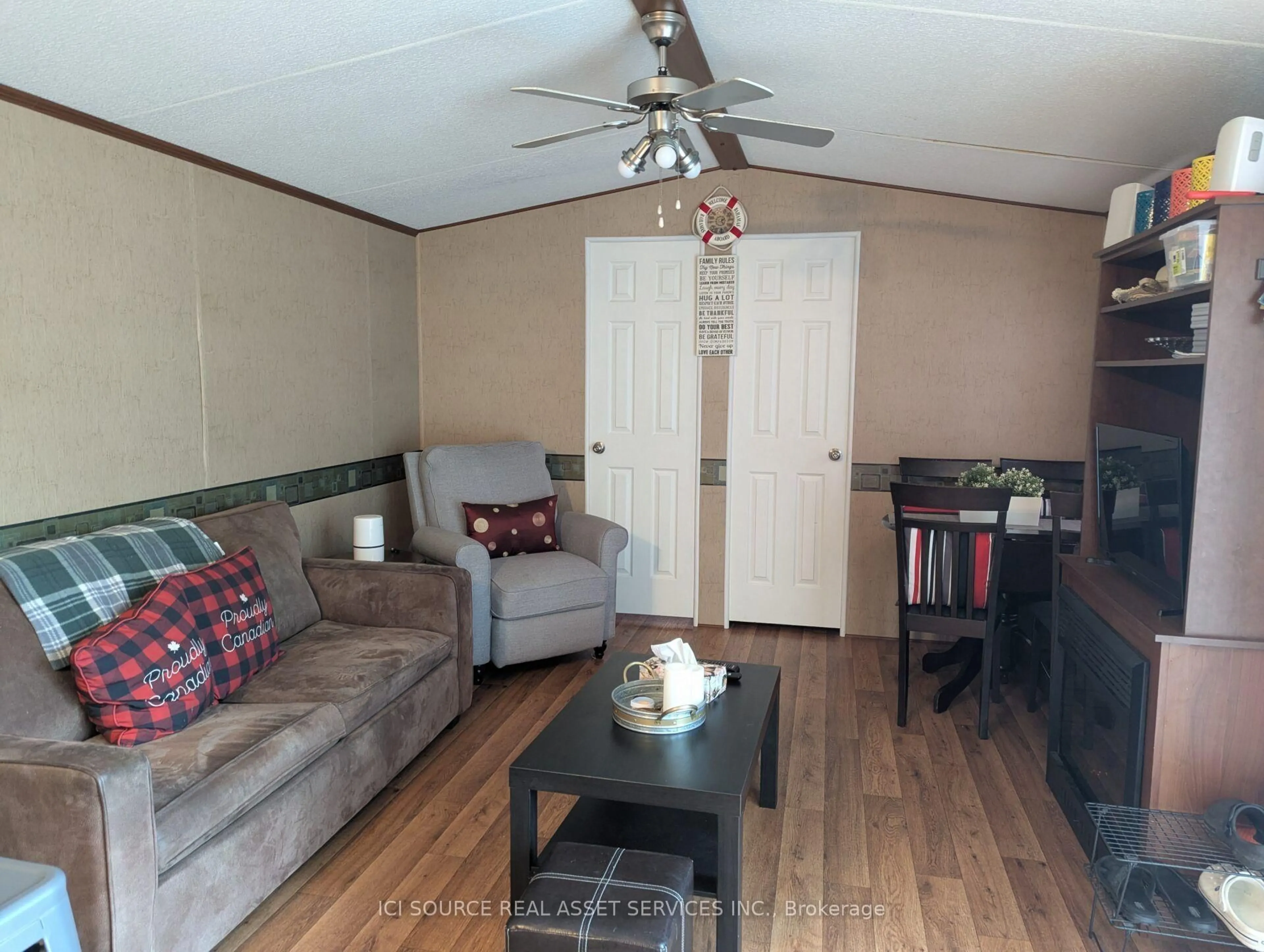 Living room with furniture, wood/laminate floor for 1336 S Morrison Lake Rd #MWLB03, Gravenhurst Ontario P0E 1G0