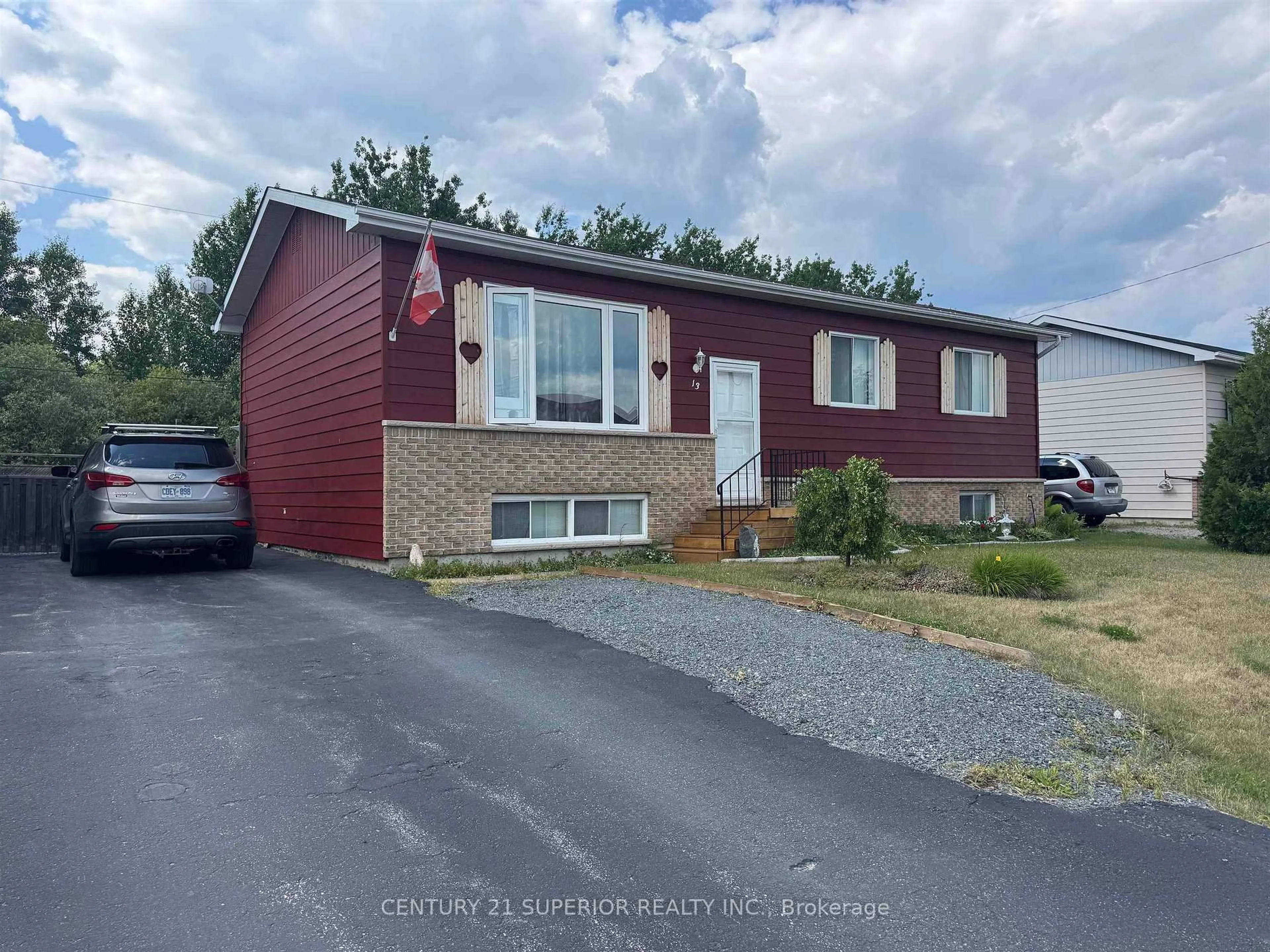 Home with vinyl exterior material, street for 13 Moose Dr, Manitouwadge Ontario P0T 2C0