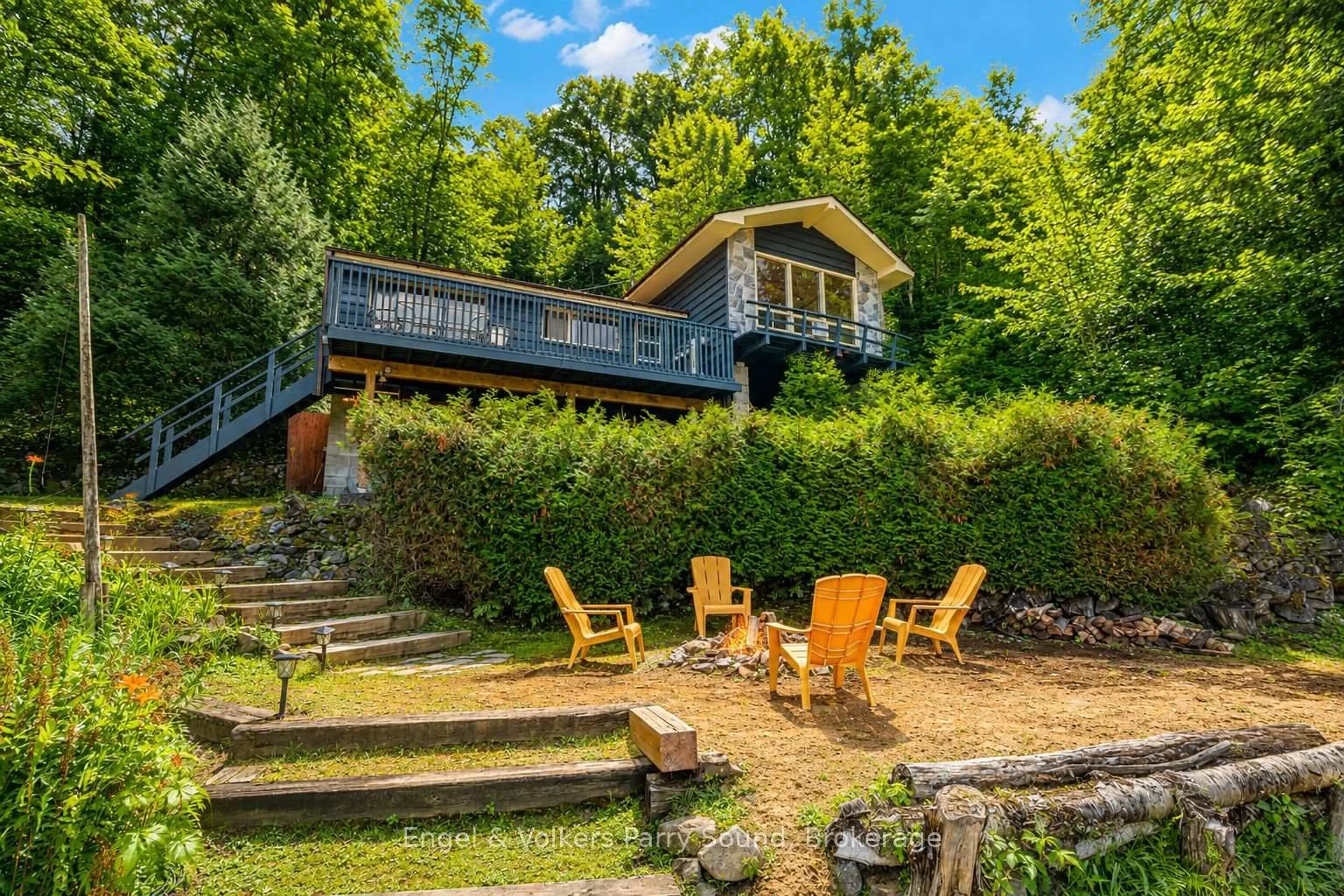 A pic from outside/outdoor area/front of a property/back of a property/a pic from drone, water/lake/river/ocean view for 27 Lower Lane, Seguin Ontario P2A 0B2