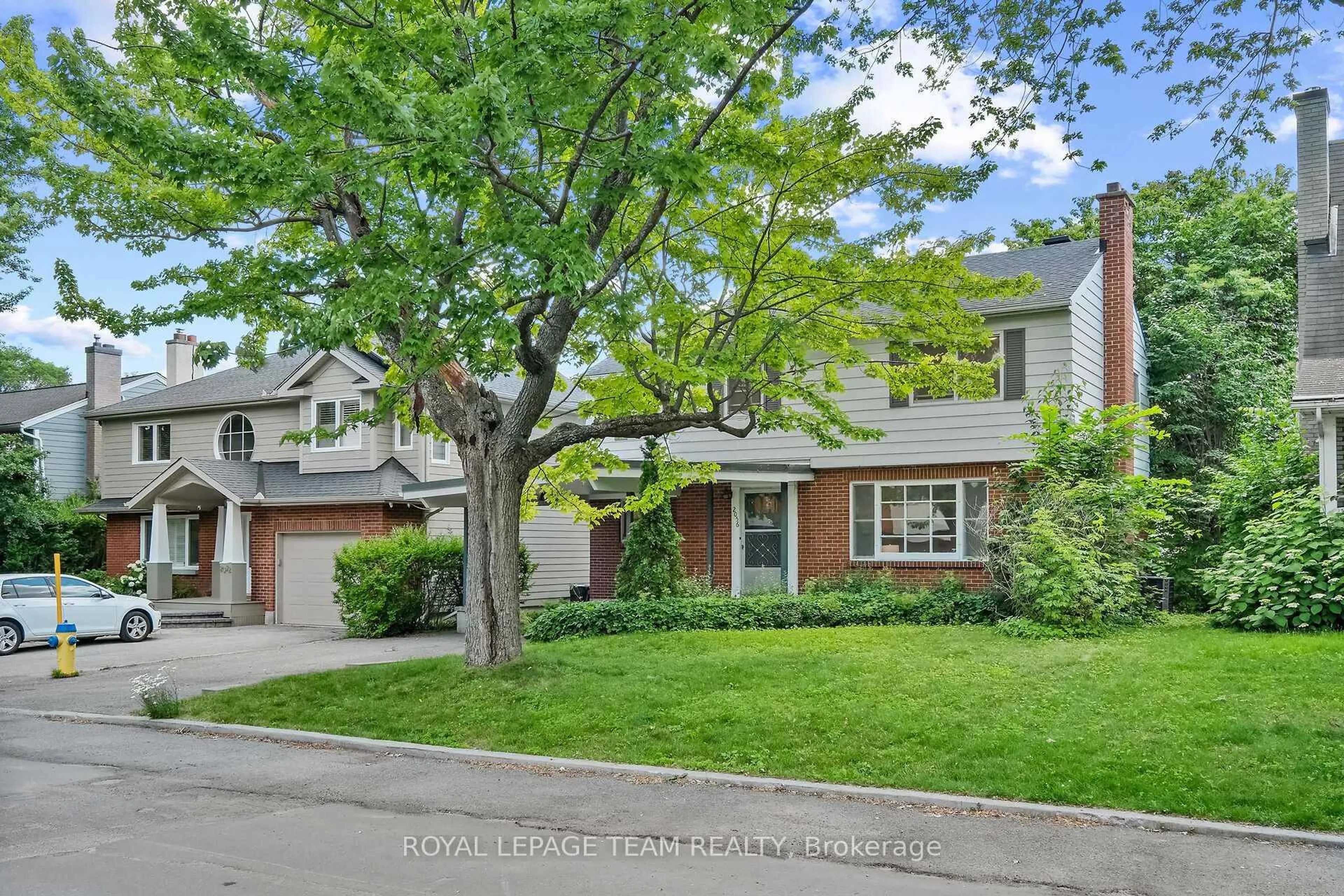 Home with brick exterior material, street for 2056 Dovercourt Ave, Ottawa Ontario K2A 0X1
