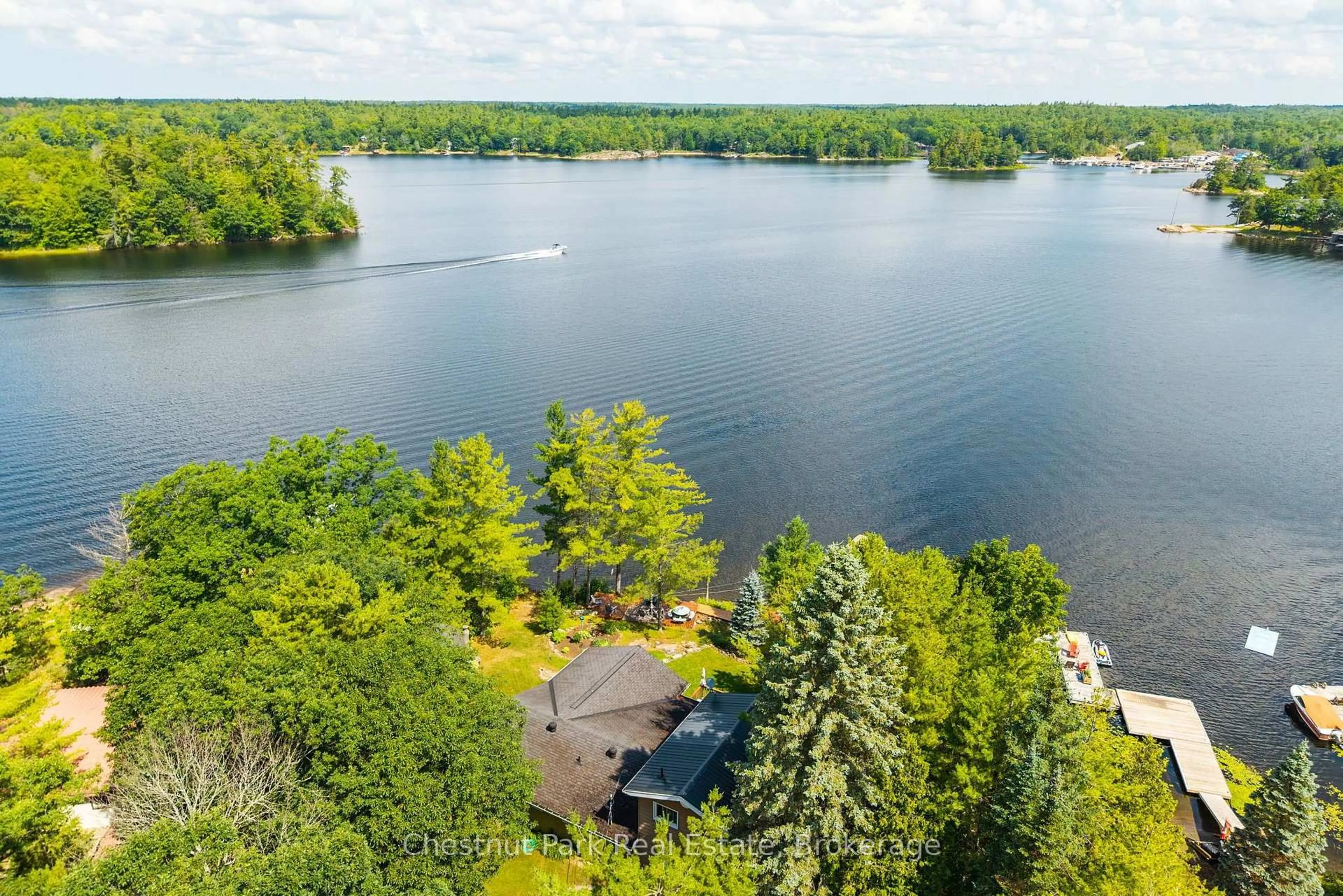 A pic from outside/outdoor area/front of a property/back of a property/a pic from drone, water/lake/river/ocean view for 300 Birch Acres Dr, Georgian Bay Ontario P0E 1E0